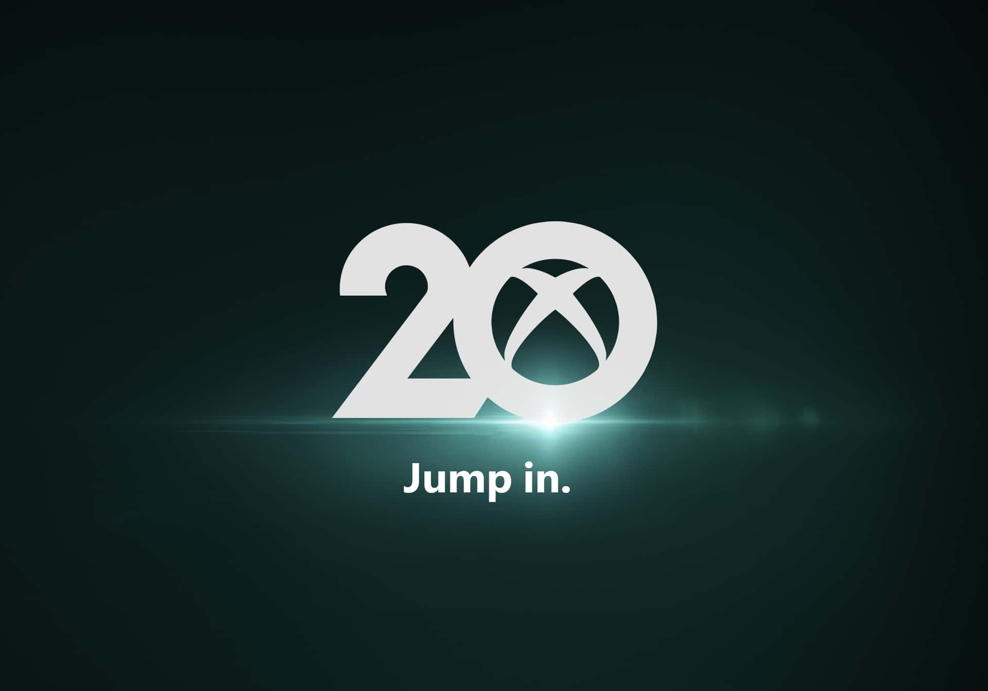 Xbox 20週年紀念標誌，帶有「Jump in.」文字，背景為深藍綠色。