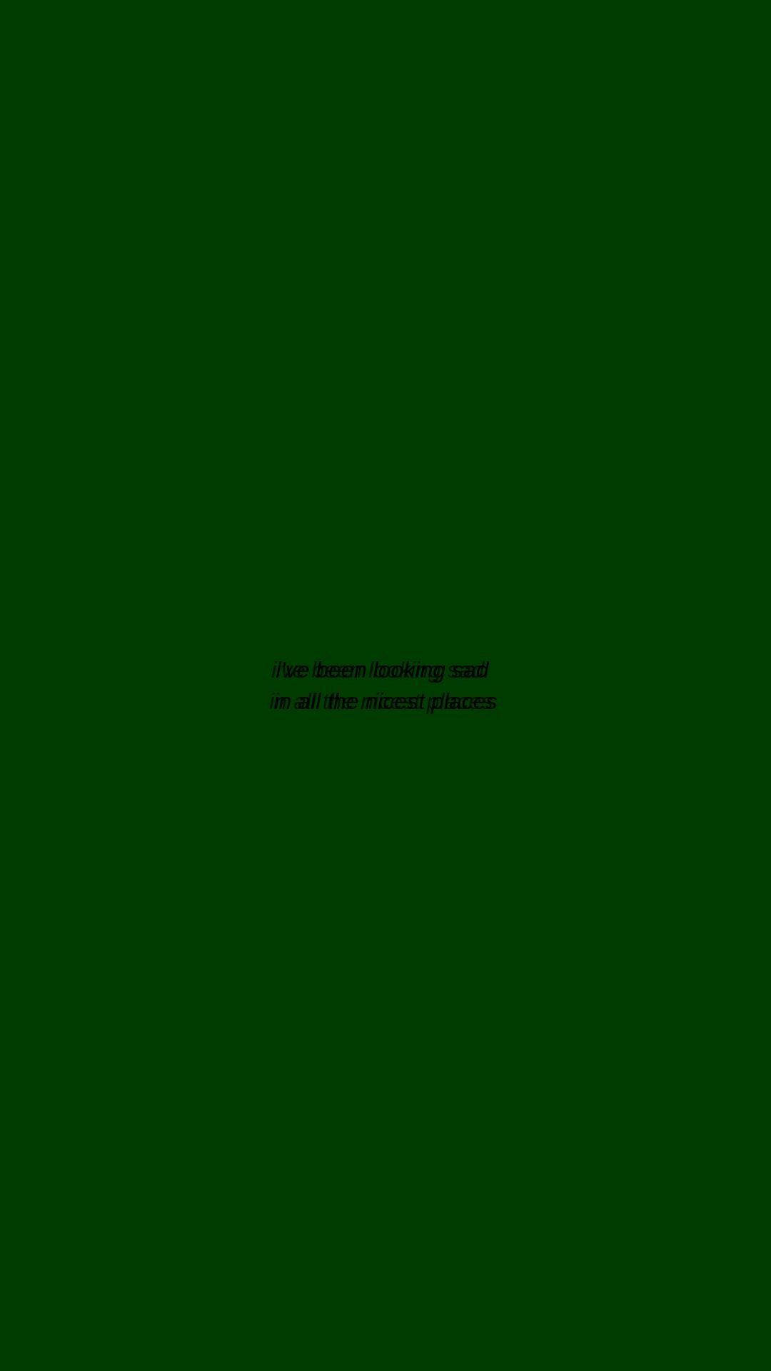 深綠色背景上的文字引用「I've been looking sad in all the nicest places」