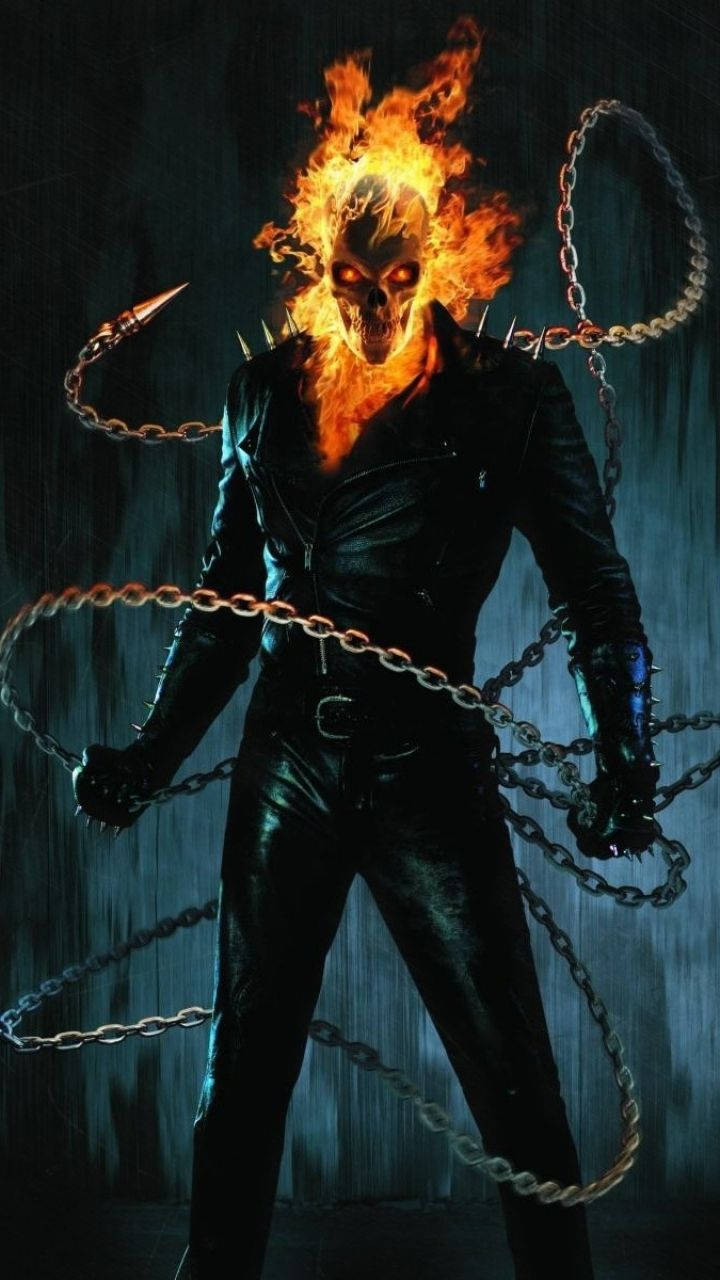 Ghost Rider 在雨夜場景中，擁有火焰骷髏頭和鎖鏈。 — 鬼 Rider 壁紙