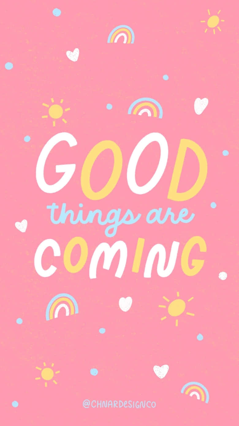 粉紅色背景，上面有「GOOD things are COMING」文字和彩虹、太陽、心形圖標。