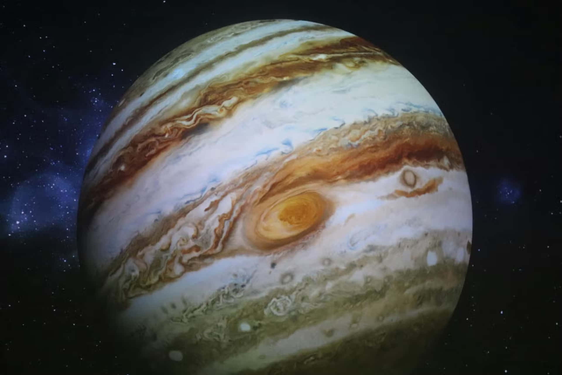 木星帶有旋轉風暴和星場 — 木星 GIF 壁紙