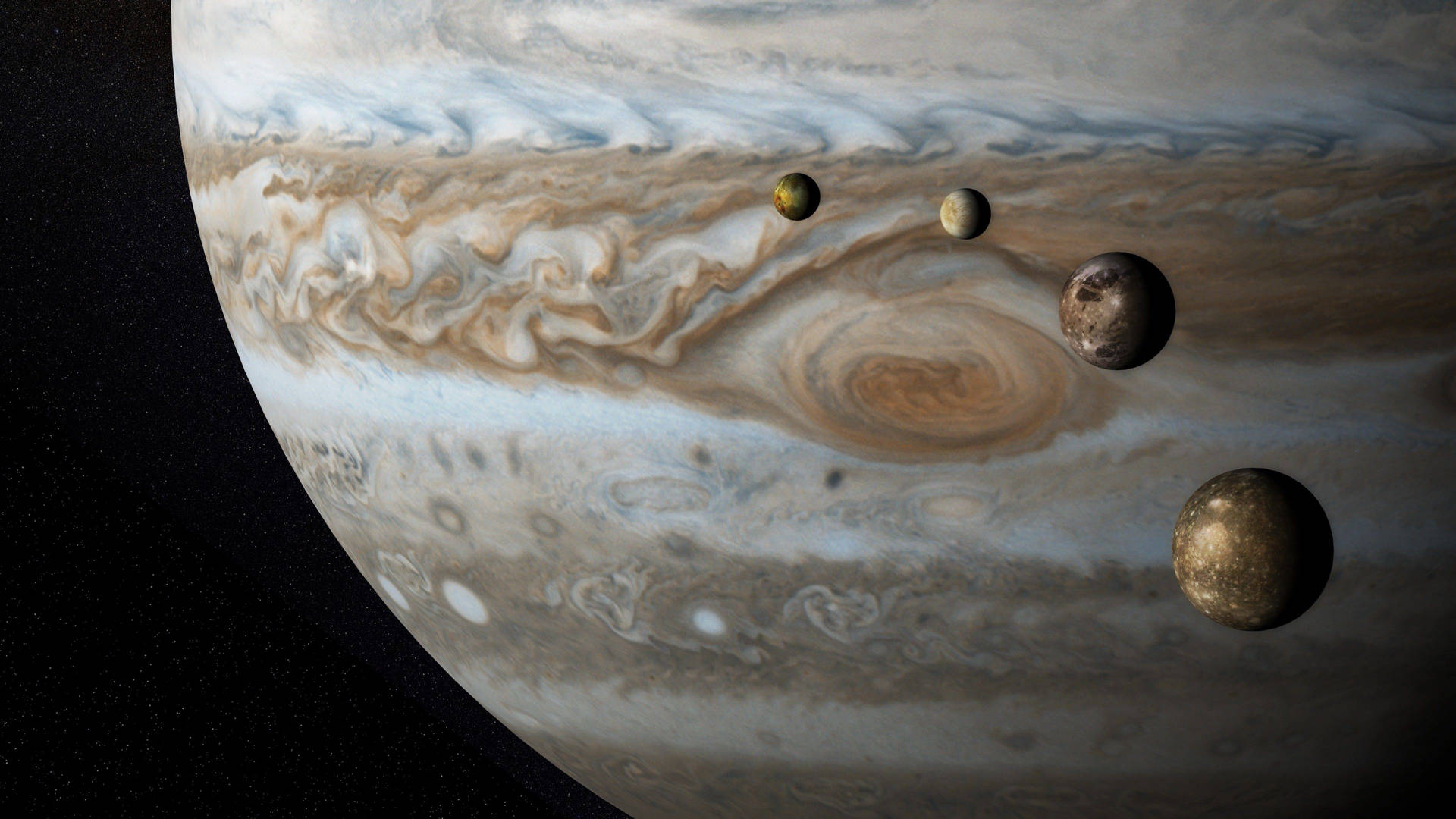 木星與四顆衛星在太空中環繞，背景佈滿繁星。