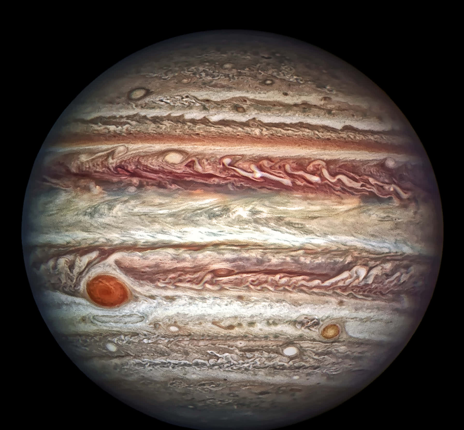 木星帶有漩渦雲帶和大紅斑，背景為黑色太空。 — 木星 GIF 壁紙