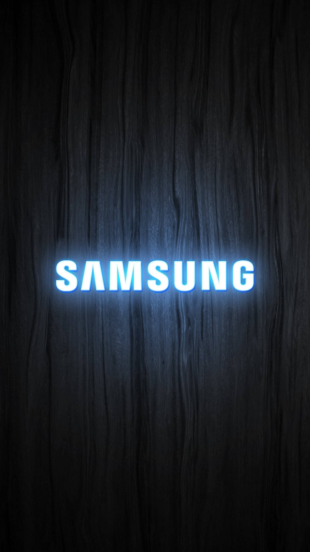 深色木紋上發光的藍色Samsung標誌。