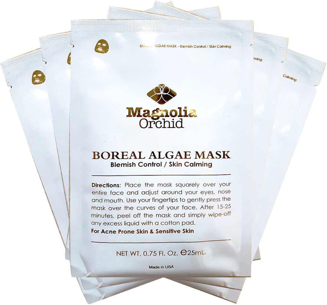 木蘭蘭花北極藻面膜包裝 壁紙 — 五個白色Magnolia Orchid Boreal Algae Mask包裝以扇形排列在黑色背景上，帶有金色品牌標識。