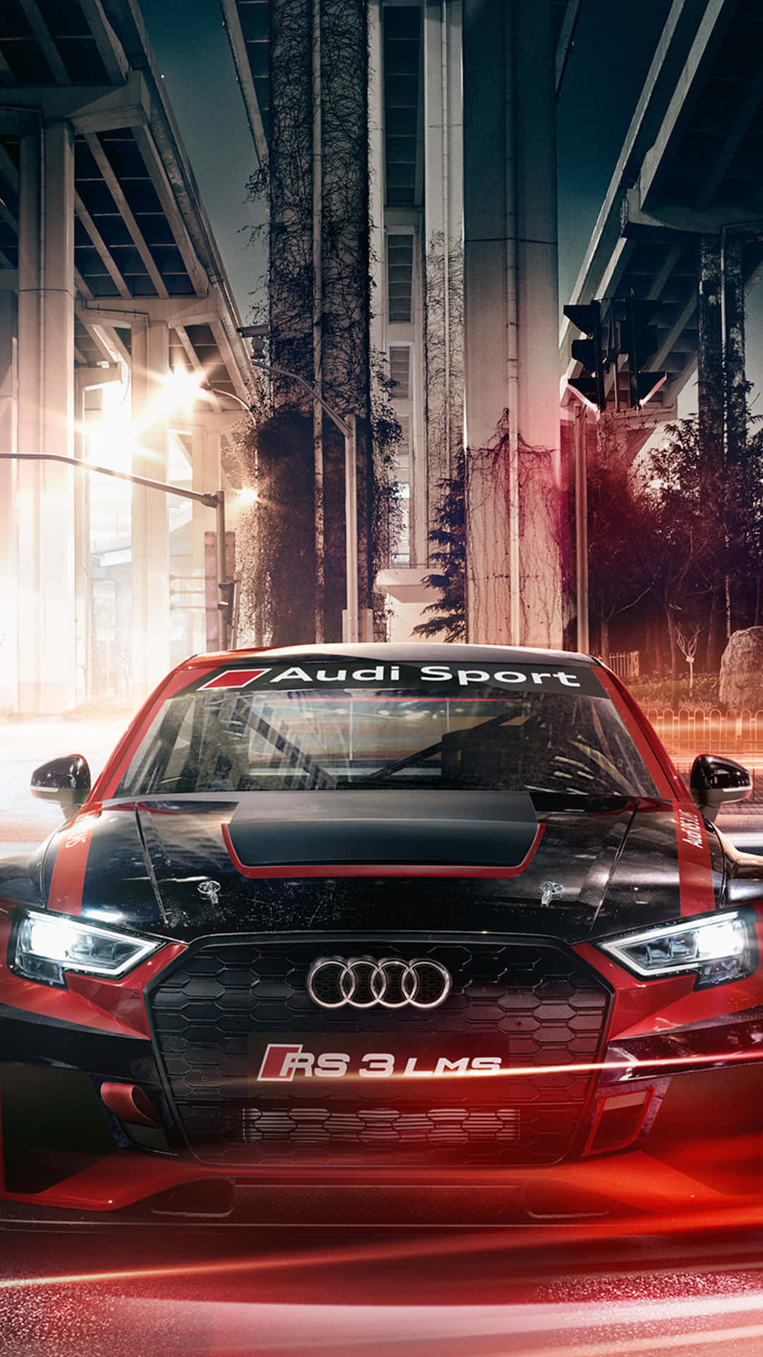 夜間停放在城市立交橋下的紅色Audi RS 3 LMS賽車。