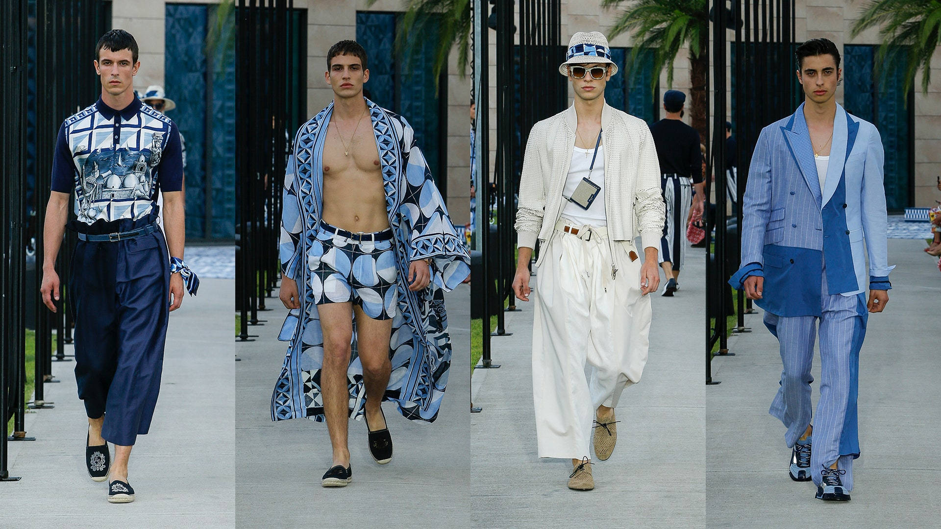 四位男裝模特兒穿著夏季主題服裝走在天橋上。