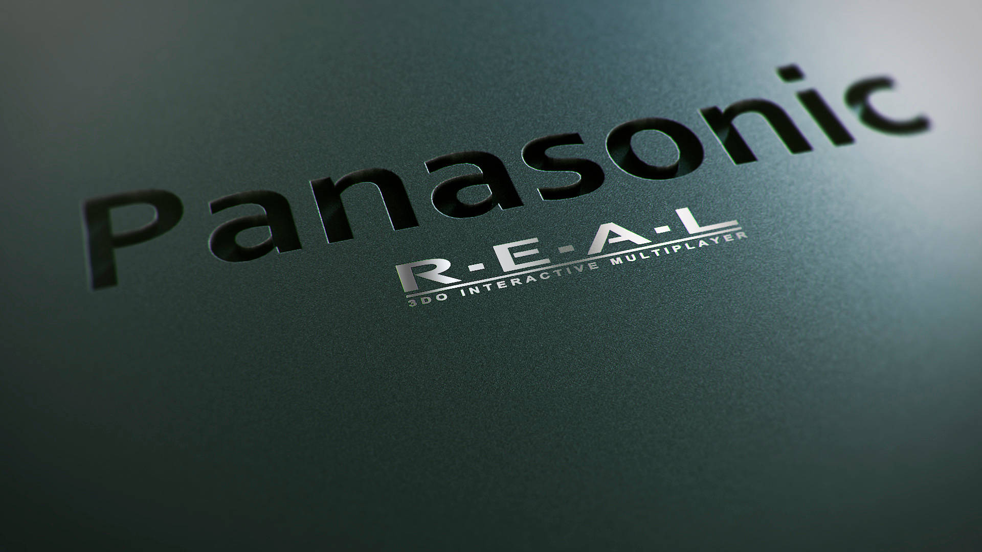 Panasonic R-E-A-L 3DO Interactive Multiplayer 標誌在深綠色紋理背景上。