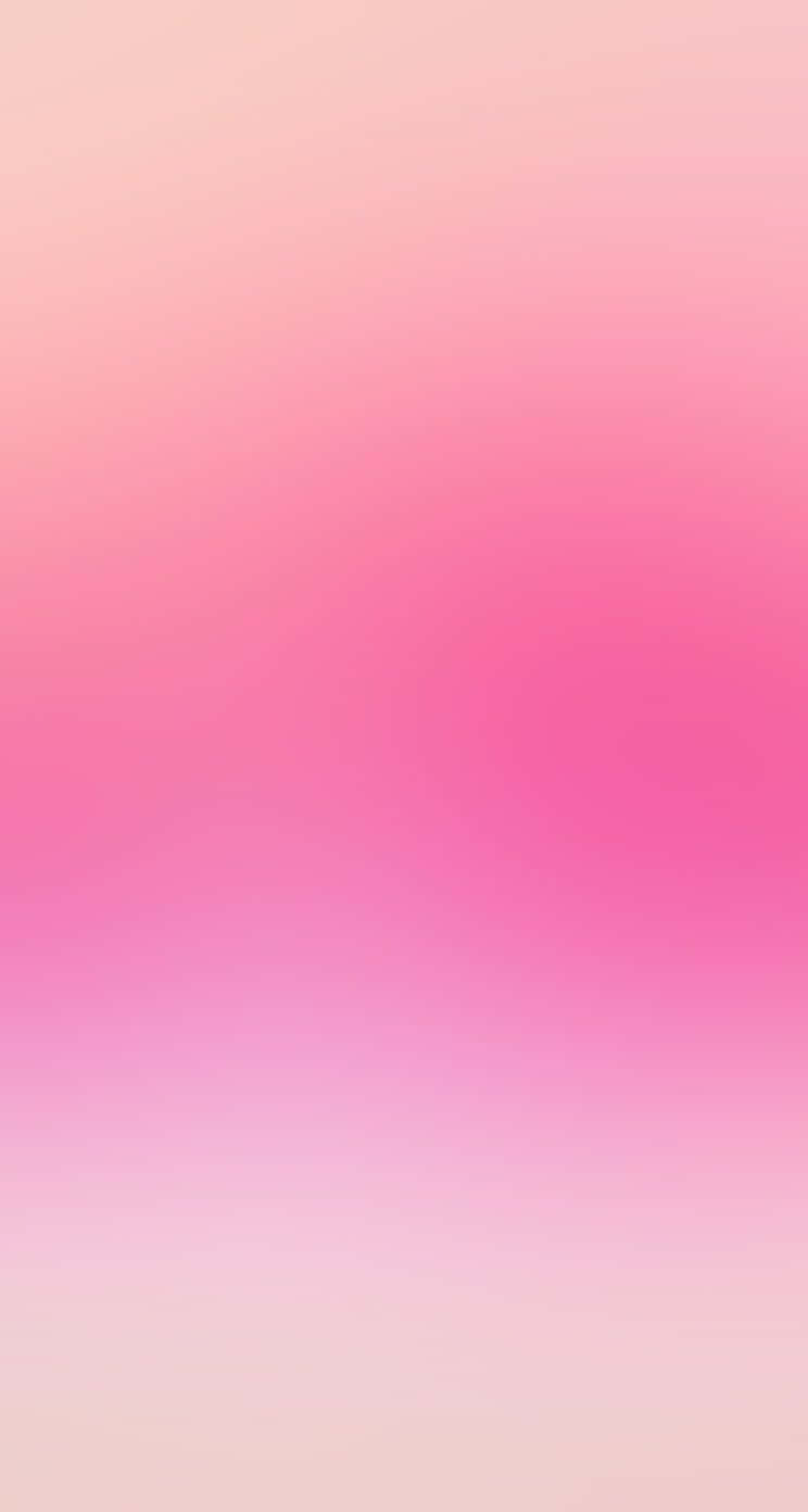 一個令人放鬆嘅粉紅色漸變背景，顏色過渡柔和。 — 粉紅色 iPhone 壁紙