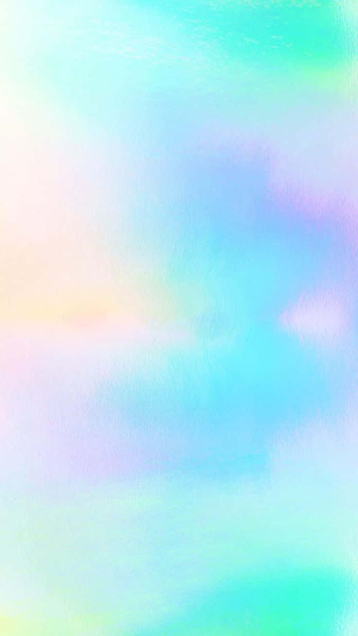 Pastel Tie Dye 桌布 壁紙 — 柔和嘅薄荷藍、薰衣草同蜜桃色粉彩漸變，帶有輕柔水彩質感。