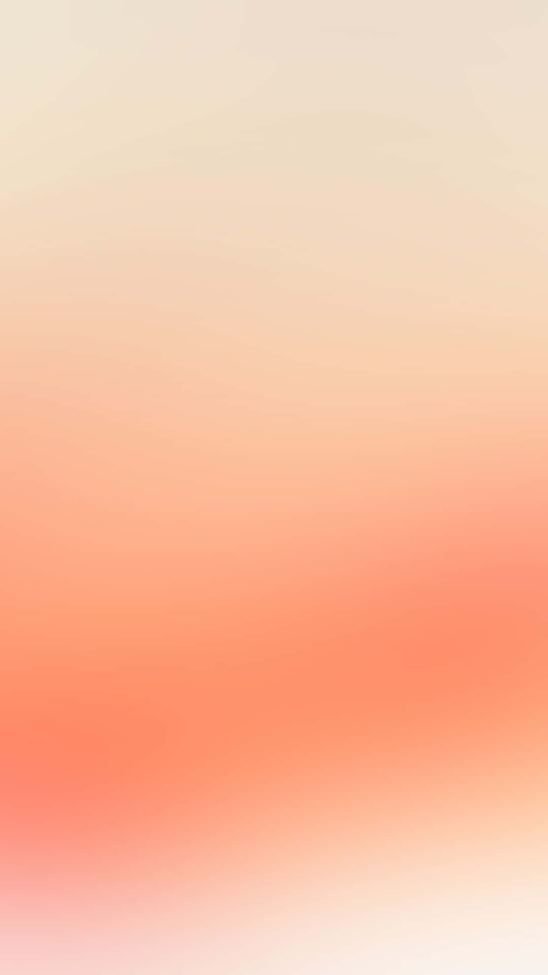 Peach iPhone 桌布 壁紙 — 柔和漸變牆紙，從奶油米色過渡到溫暖珊瑚粉，帶有微妙的模糊紋理。
