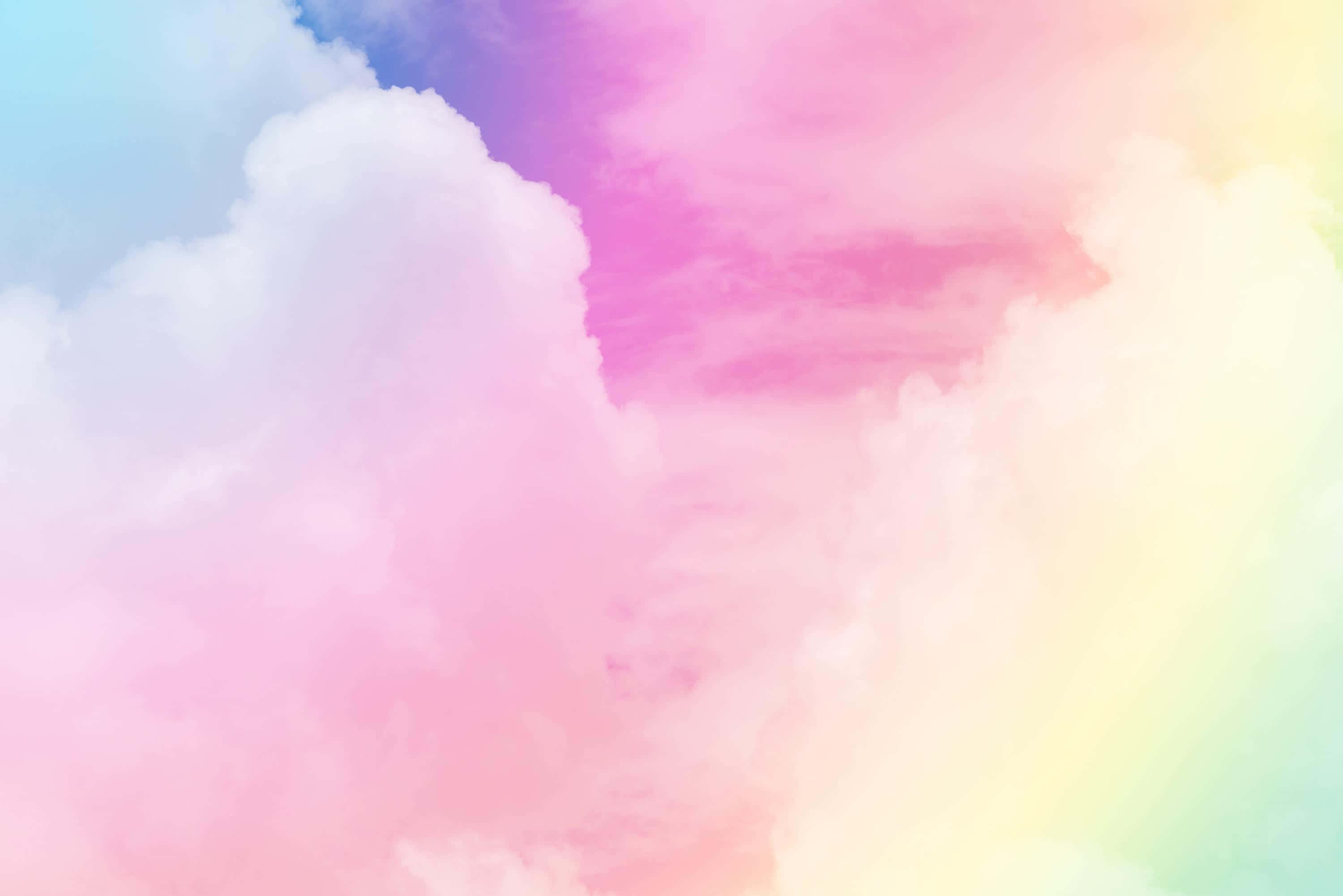Pastel Phone 桌布 壁紙 — 柔和的粉彩雲朵在天空中以粉紅、藍、黃和薰衣草色的夢幻漸變旋轉。