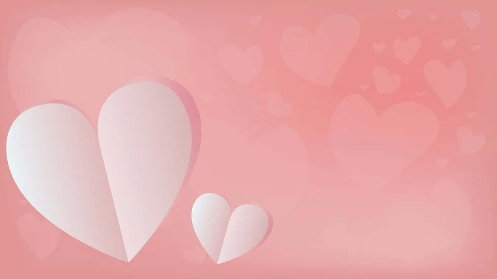 Heart Shape 桌布 壁紙 — 柔和的粉紅色漸變背景，點綴著不同大小的層疊剪紙心形，營造出溫柔浪漫的氛圍。