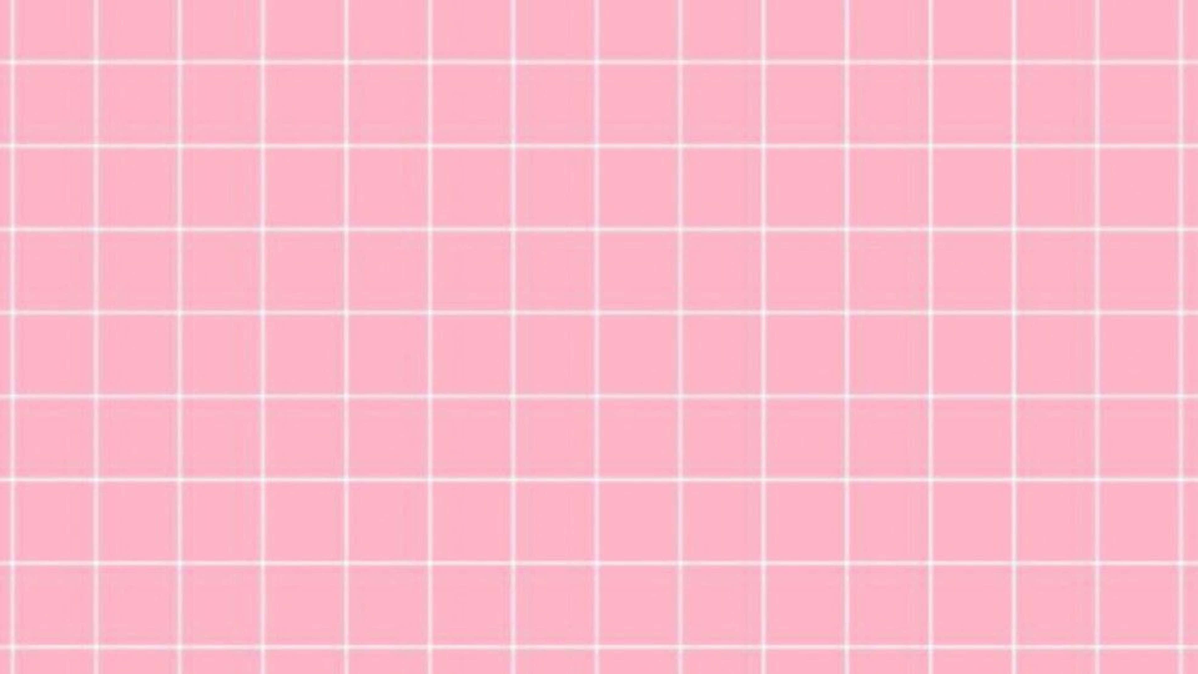 Pastel Aesthetic Grid 桌布 壁紙 — 柔和的粉紅色背景，帶有乾淨的白色網格圖案，營造出簡約而平靜的視覺紋理。