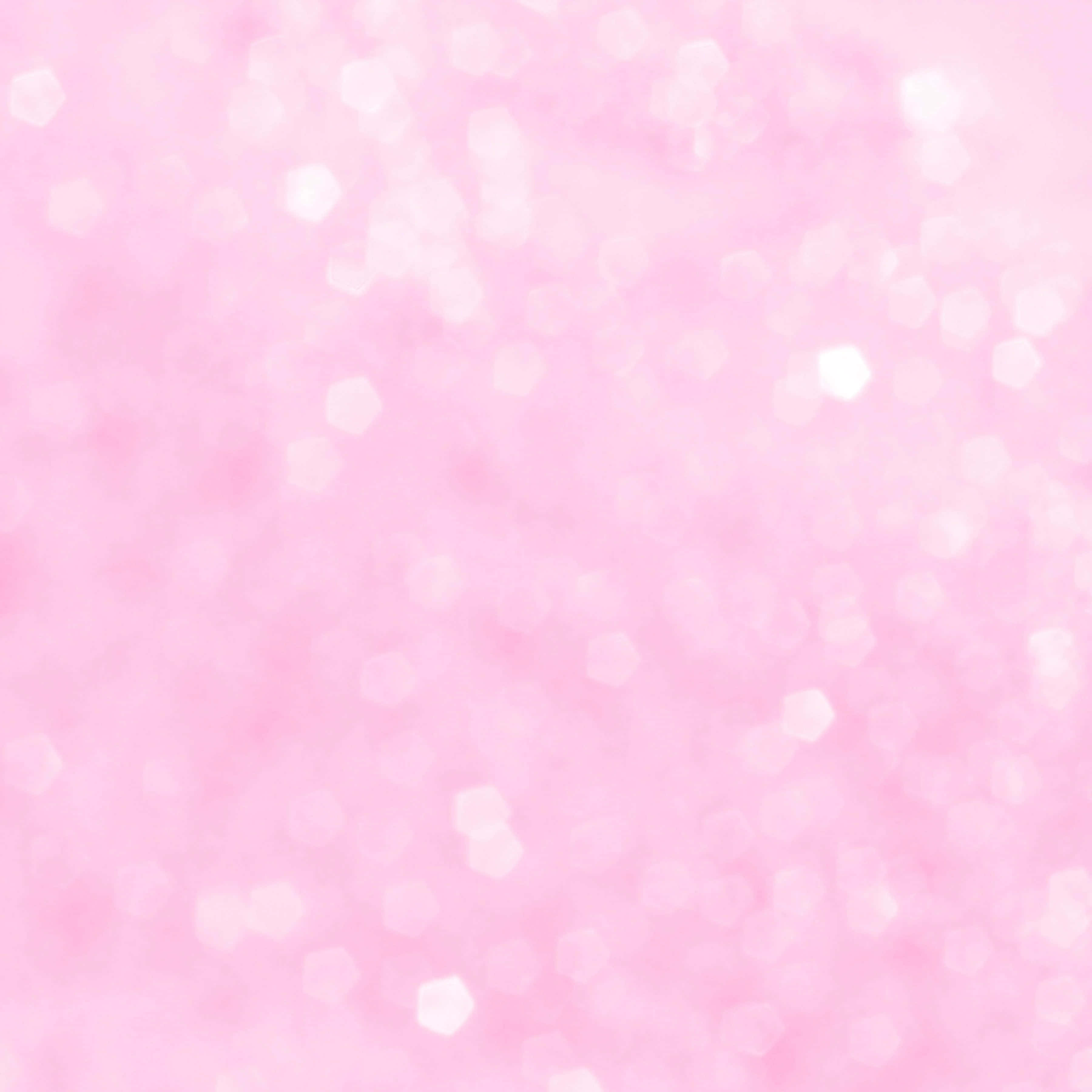 Pretty Pink 桌布 壁紙 — 柔和的粉紅色背景，散落著六角形散景燈光，營造出夢幻般的發光效果。