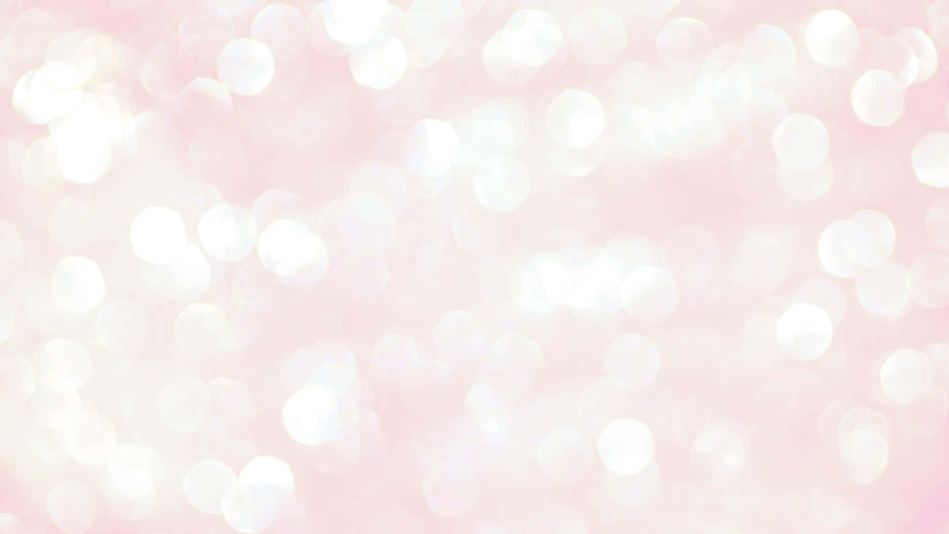 Pink Sparkles 桌布 壁紙 — 柔和的粉紅色背景，散落著閃爍的白色散景光點，營造出夢幻空靈的氛圍。