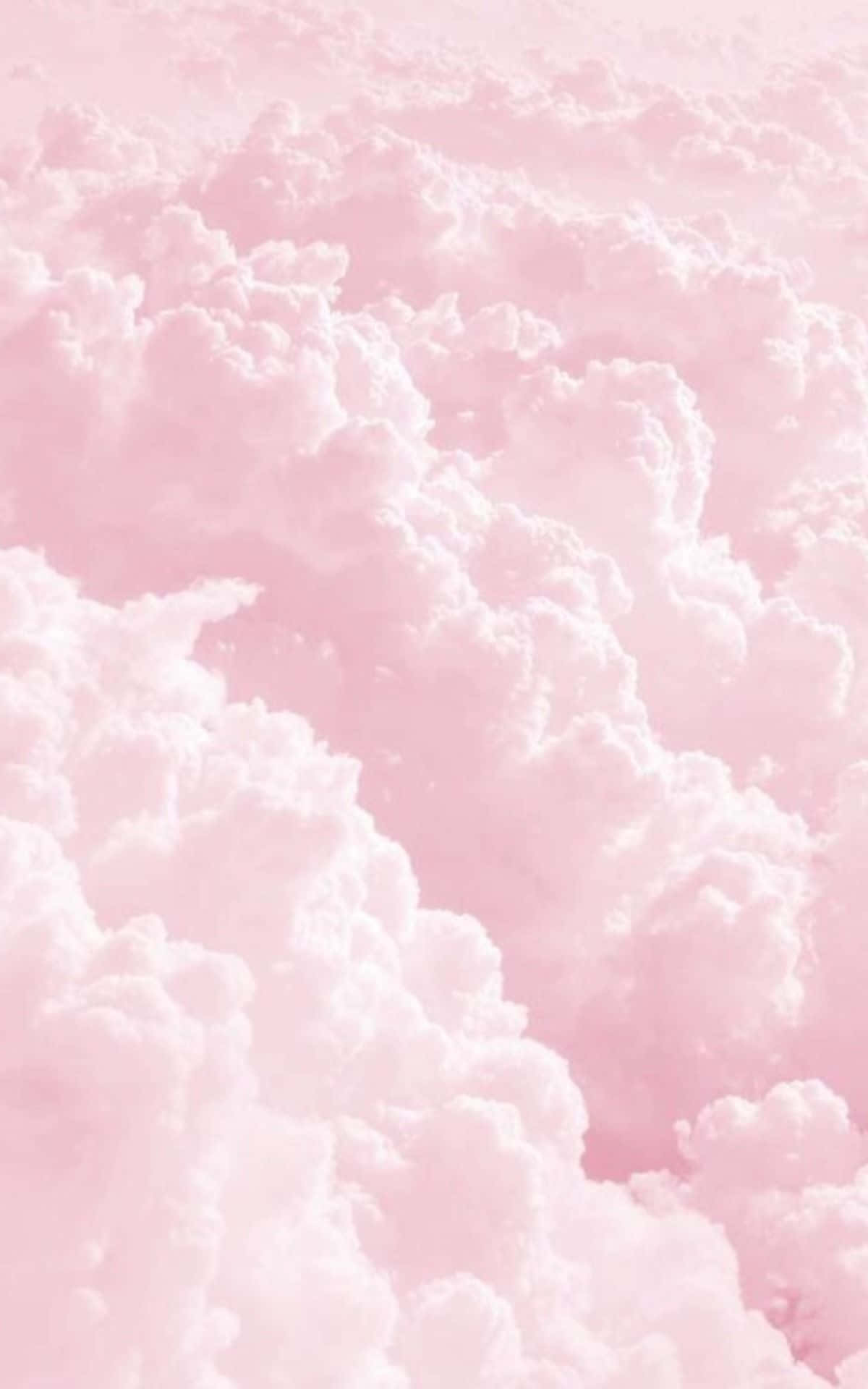 Pastel Phone 桌布 壁紙 — 柔和的粉紅雲朵在夢幻的天空中飄移，帶有溫柔的漸變和蓬鬆的質感。