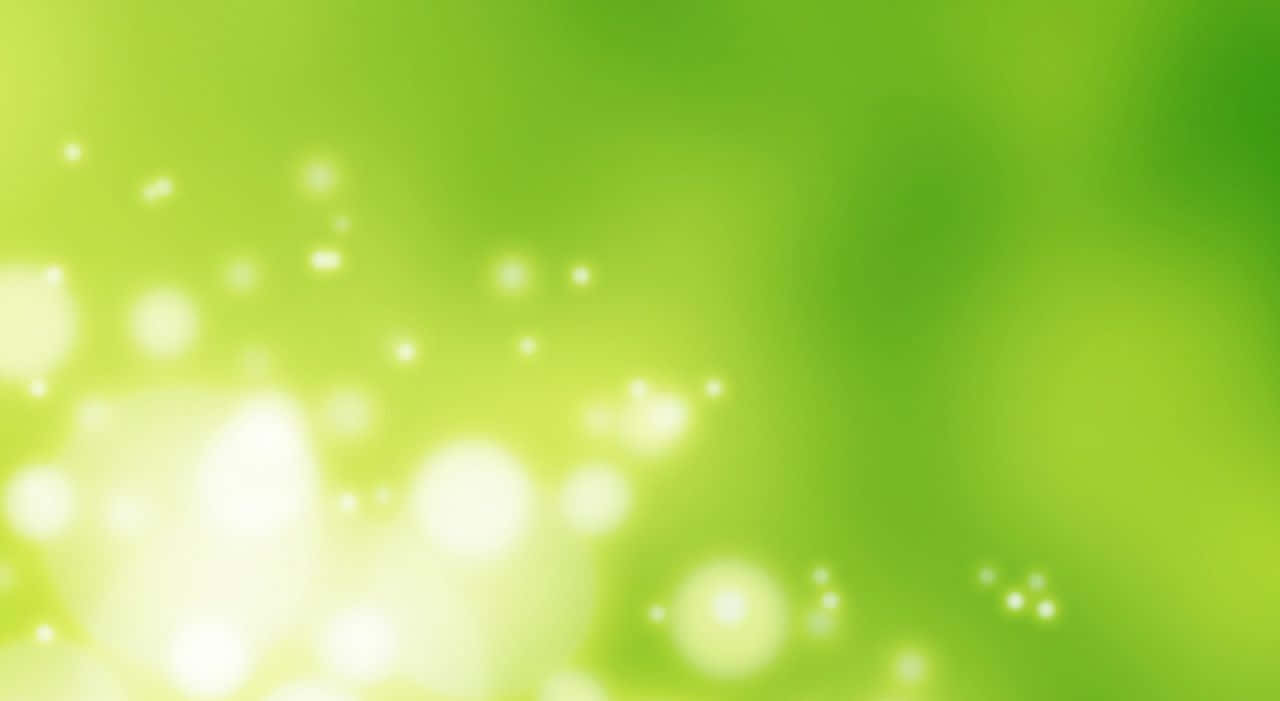 Lime Green 桌布 壁紙 — 柔和的綠色漸變背景，帶有發光的散景燈光，營造出夢幻空靈的氛圍。
