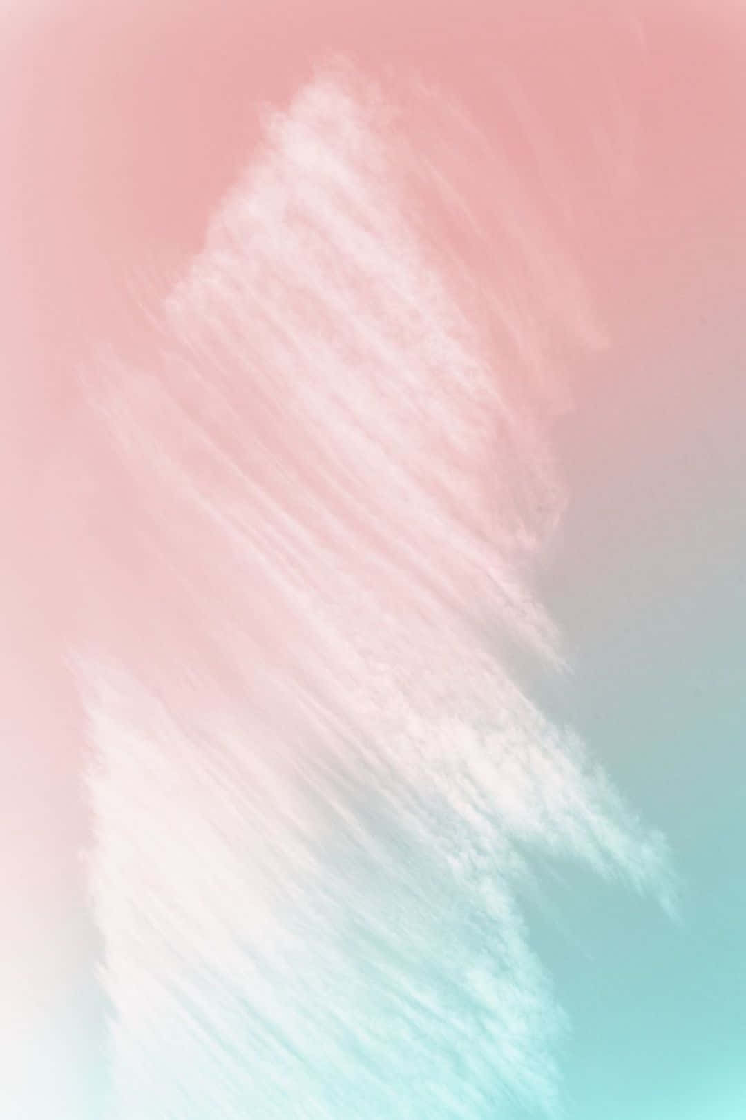 Pastel Red Aesthetic 桌布 壁紙 — 柔和粉彩漸變，帶有對角白色筆觸，融合粉紅和薄荷綠色調。