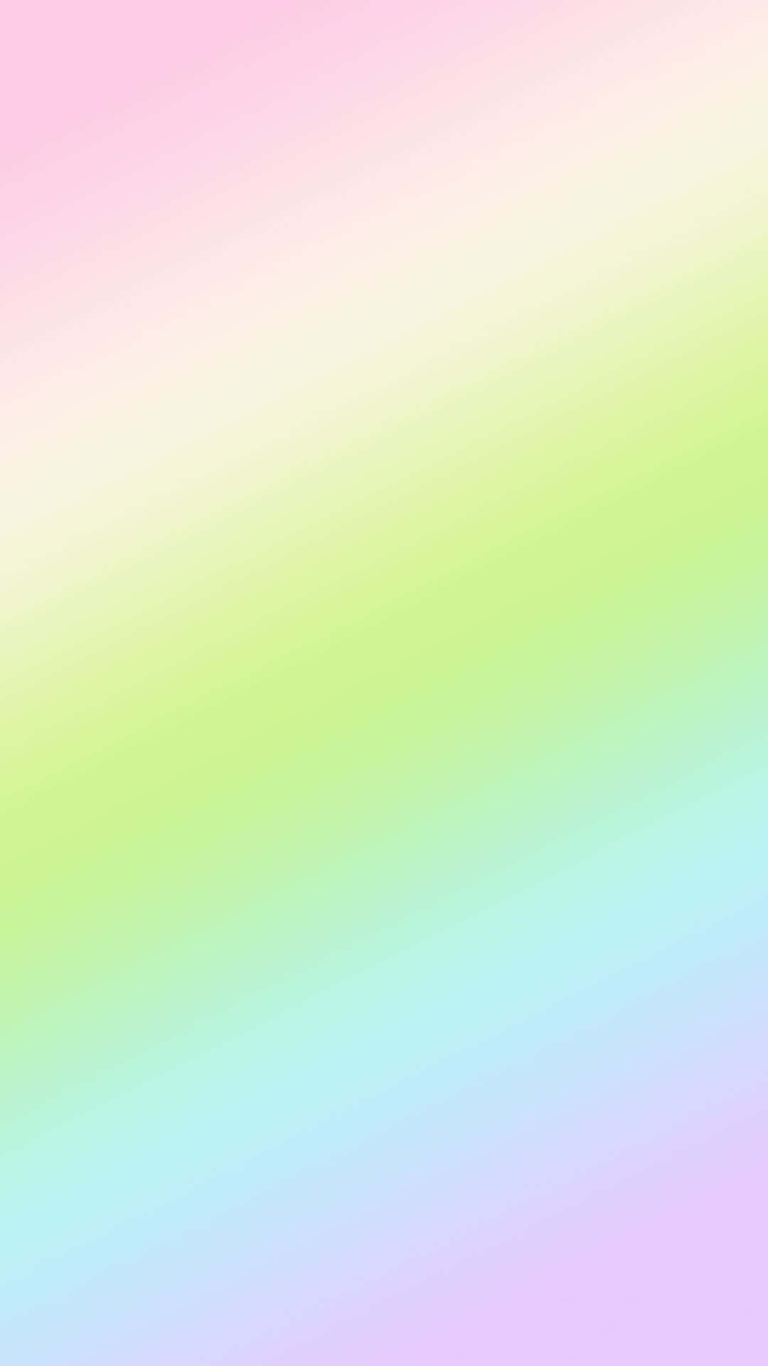 Spring Pastel 桌布 壁紙 — 柔和粉彩漸變牆紙，以對角線條從粉紅色過渡到綠色、藍色和紫色。