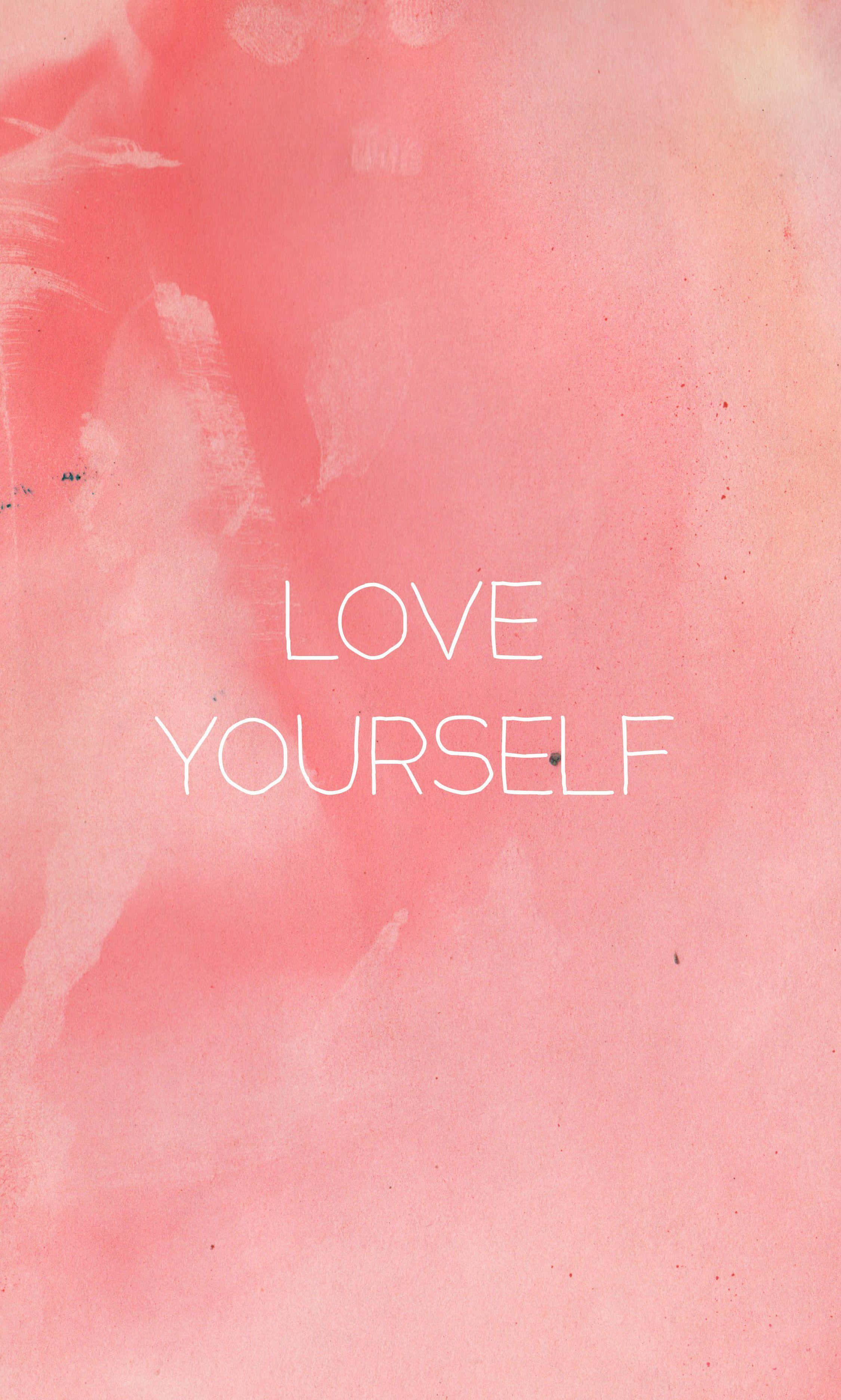 love yourself 桌布 壁紙 — 柔和粉紅色水彩背景，白色文字以極簡無襯線字體寫著love yourself。