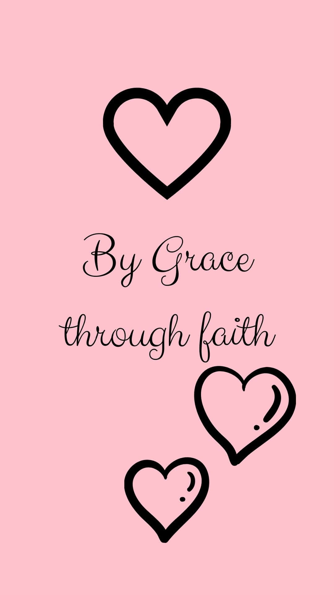 grace 桌布 壁紙 — 柔和粉紅色背景上，有黑色輪廓心形和優雅手寫體 'By Grace through faith' 字句。