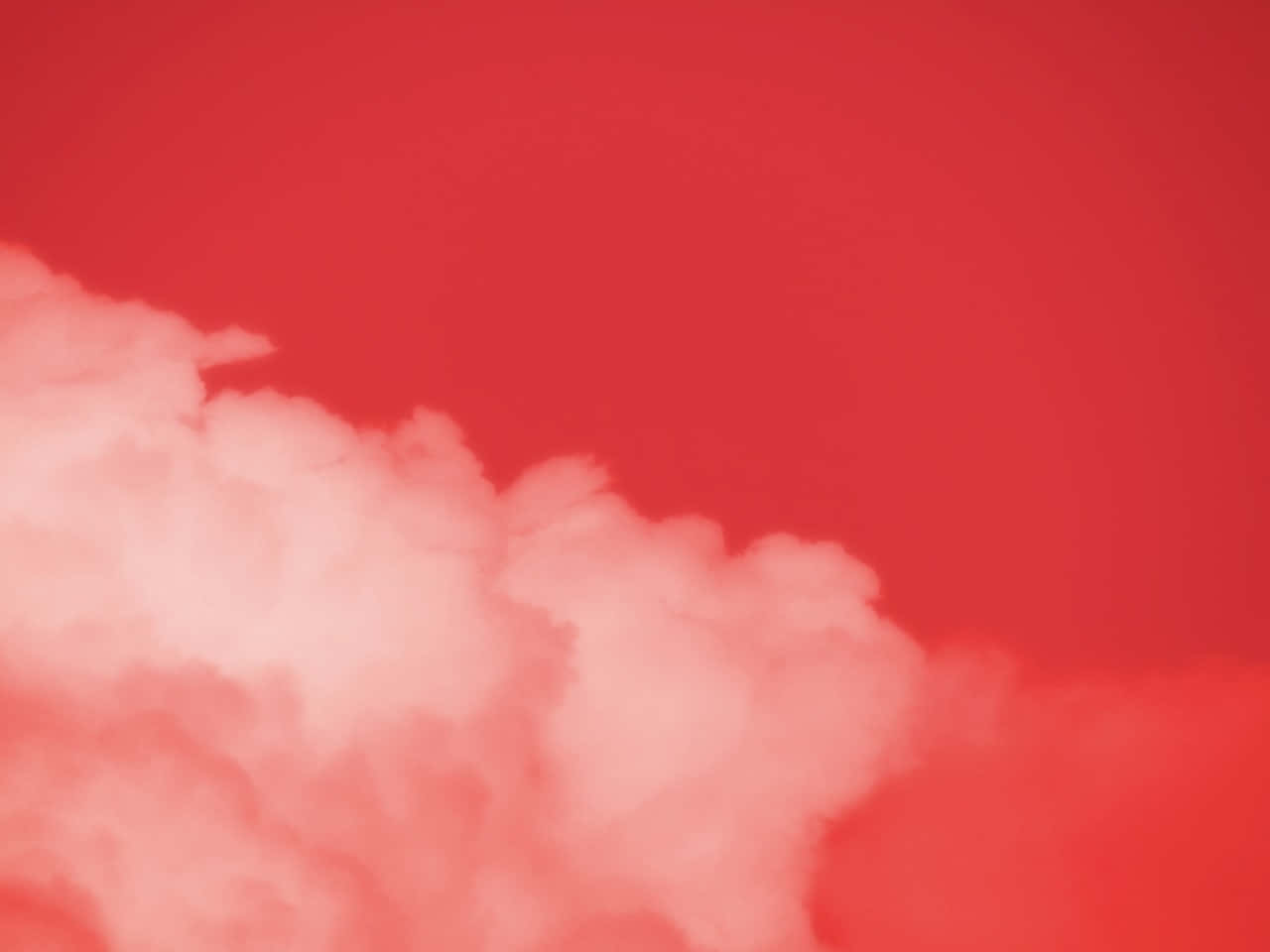 鮮紅色的天空，柔軟的白雲在地平線上飄移。