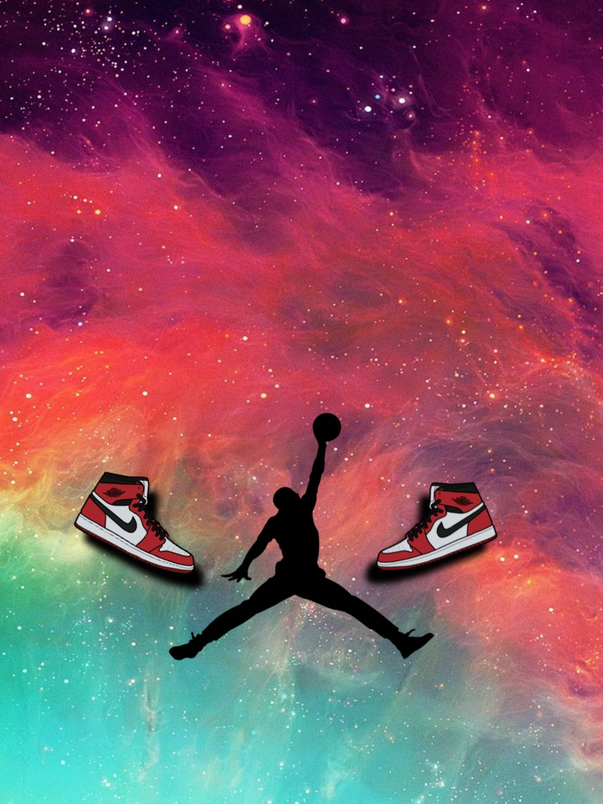 柔粉星雲 Air Jordan 壁紙 — 籃球運動員在半空中的剪影，背景是充滿活力的宇宙星雲，附近漂浮著兩雙紅白相間的運動鞋。