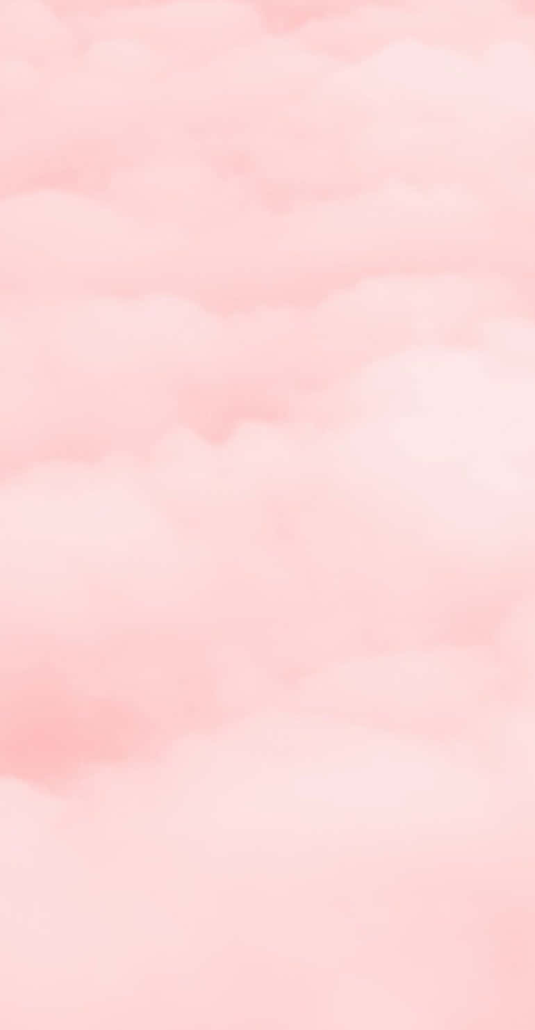 夢幻水彩天空中的柔和粉紅雲朵