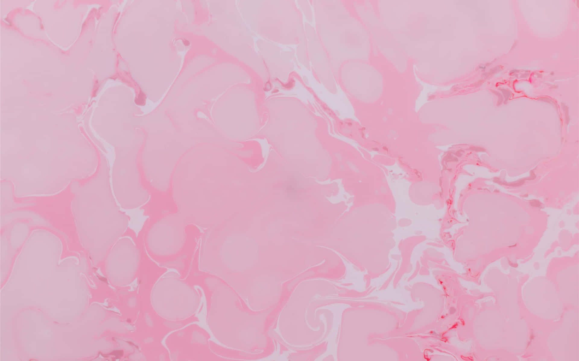 粉紅色和白色漩渦圖案的抽象流體藝術。