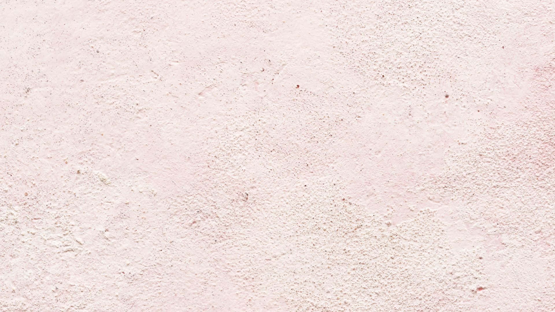 Pink Texture 桌布 壁紙 — 柔軟粉紅色紋理牆壁的特寫，帶有細微瑕疵和柔和漸變燈光。
