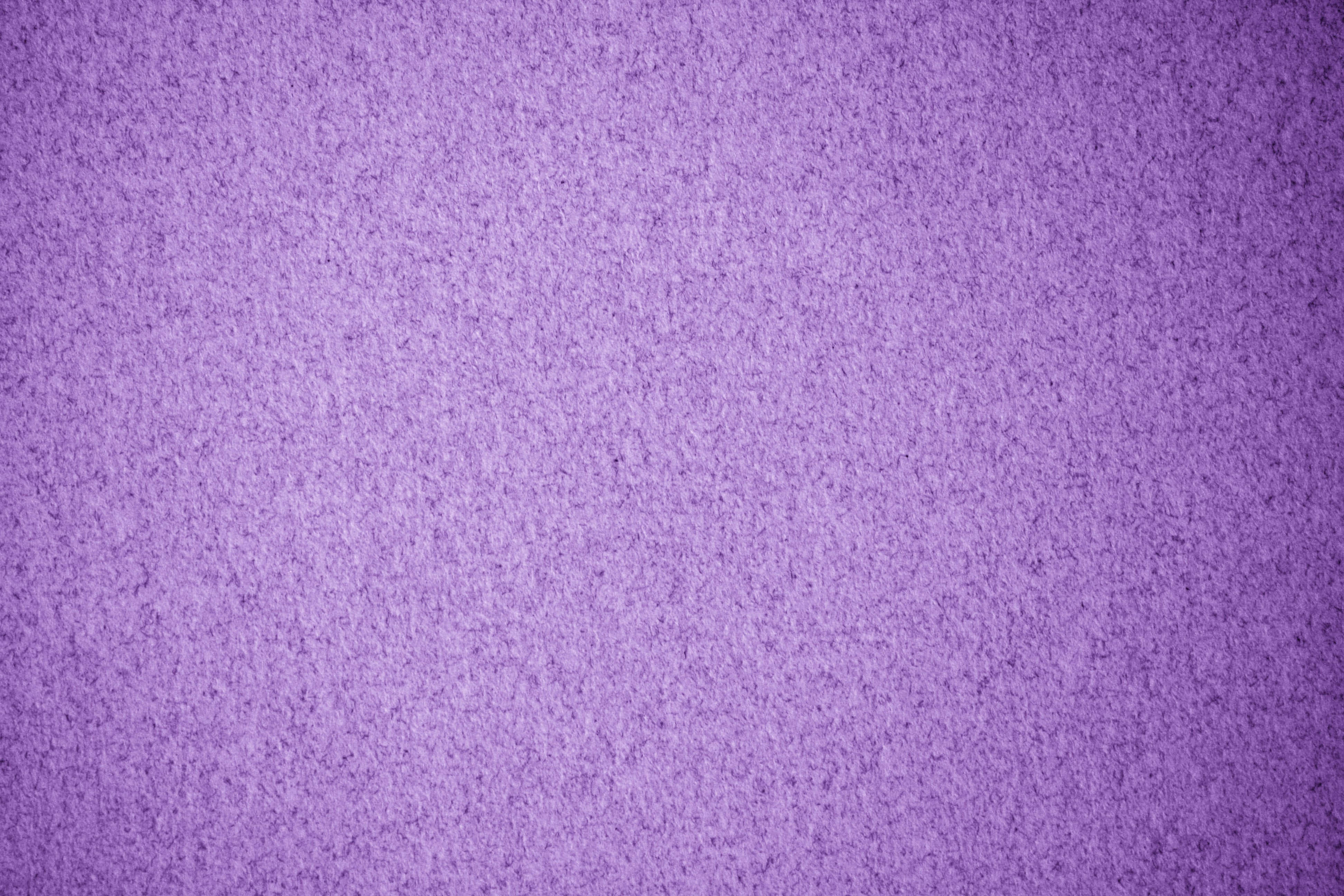 Purple Paper 桌布 壁紙 — 柔軟質感紫色絨面嘅特寫，帶有細微色調變化。