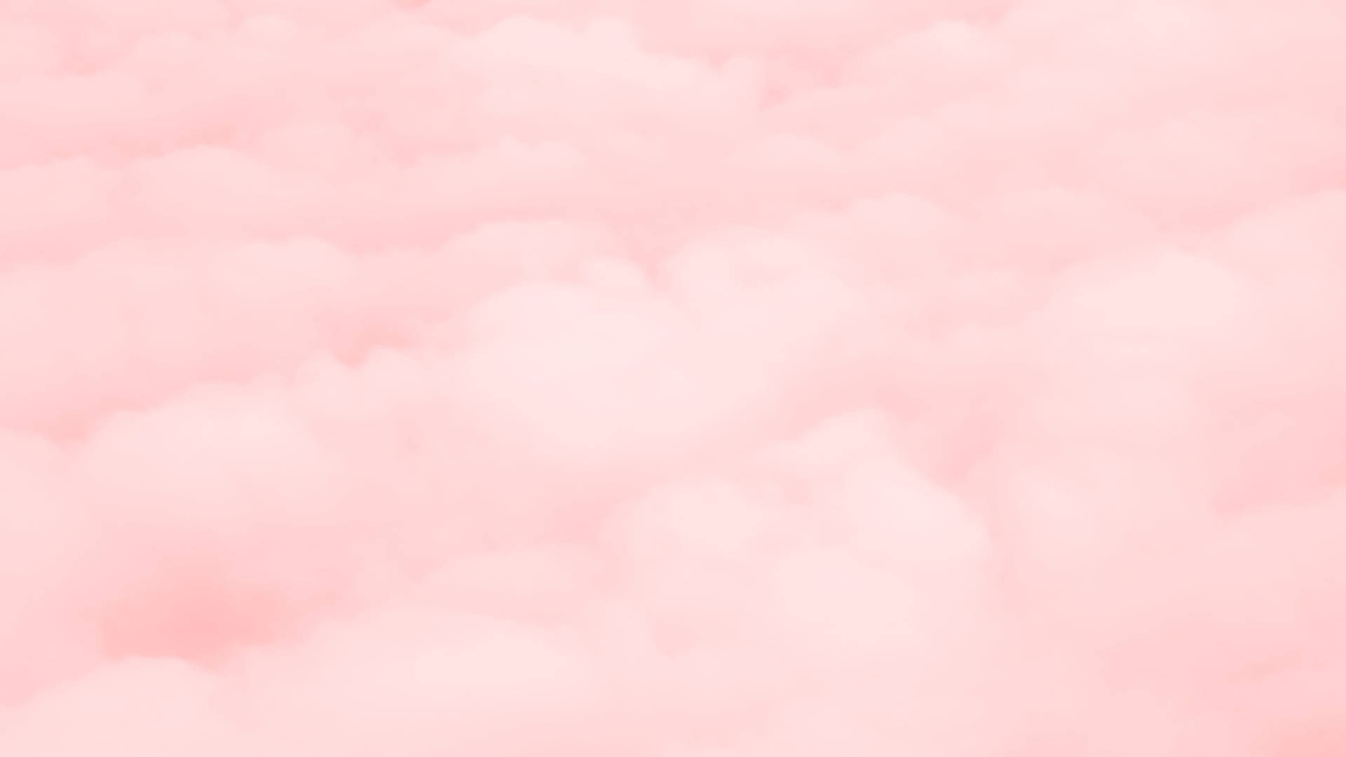 粉紅雲朵漂浮在柔和夢幻的天空中
