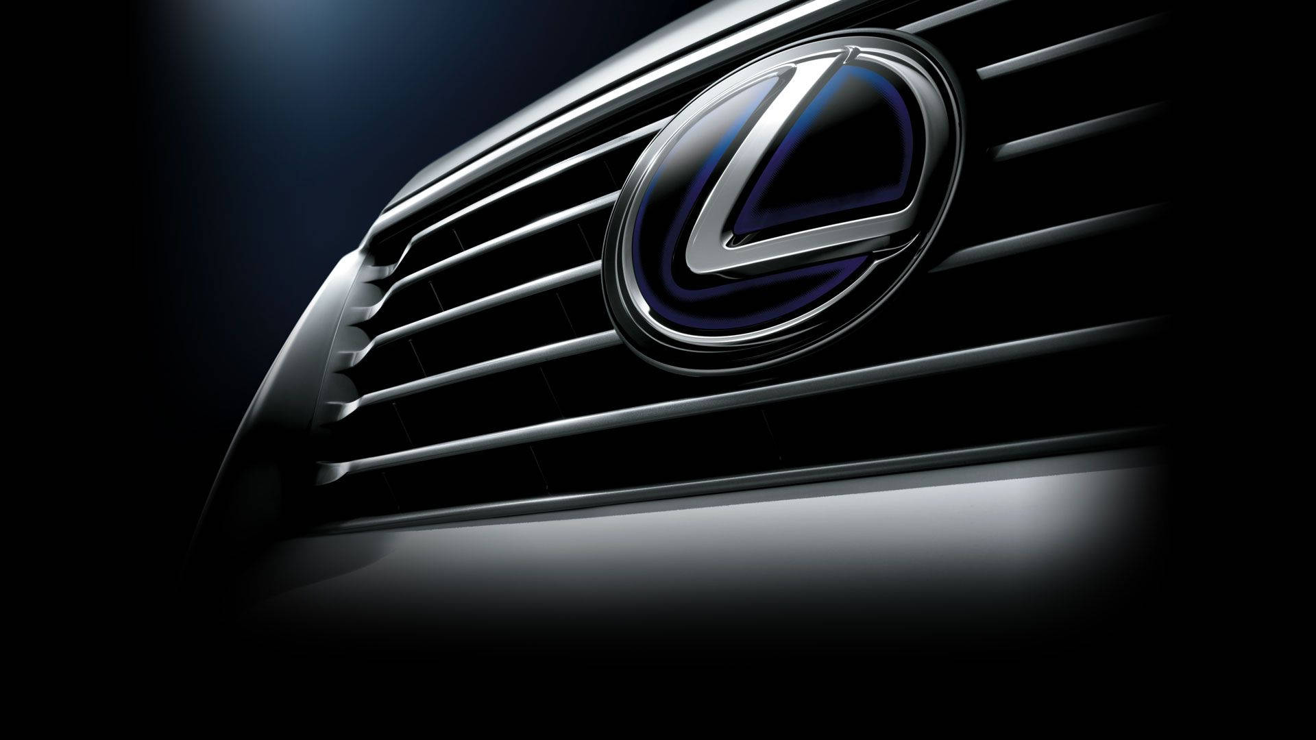 Lexus 汽車格柵標誌在黑暗的工作室環境中以藍色燈光照明