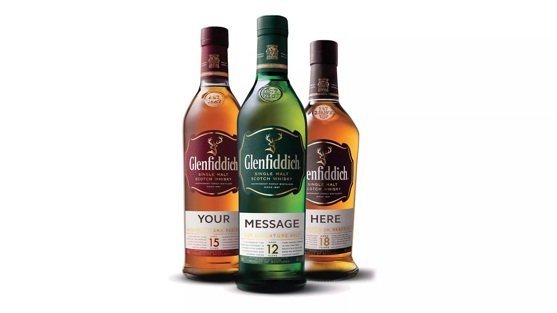 三瓶Glenfiddich威士忌，帶有可自訂標籤以供個人化。