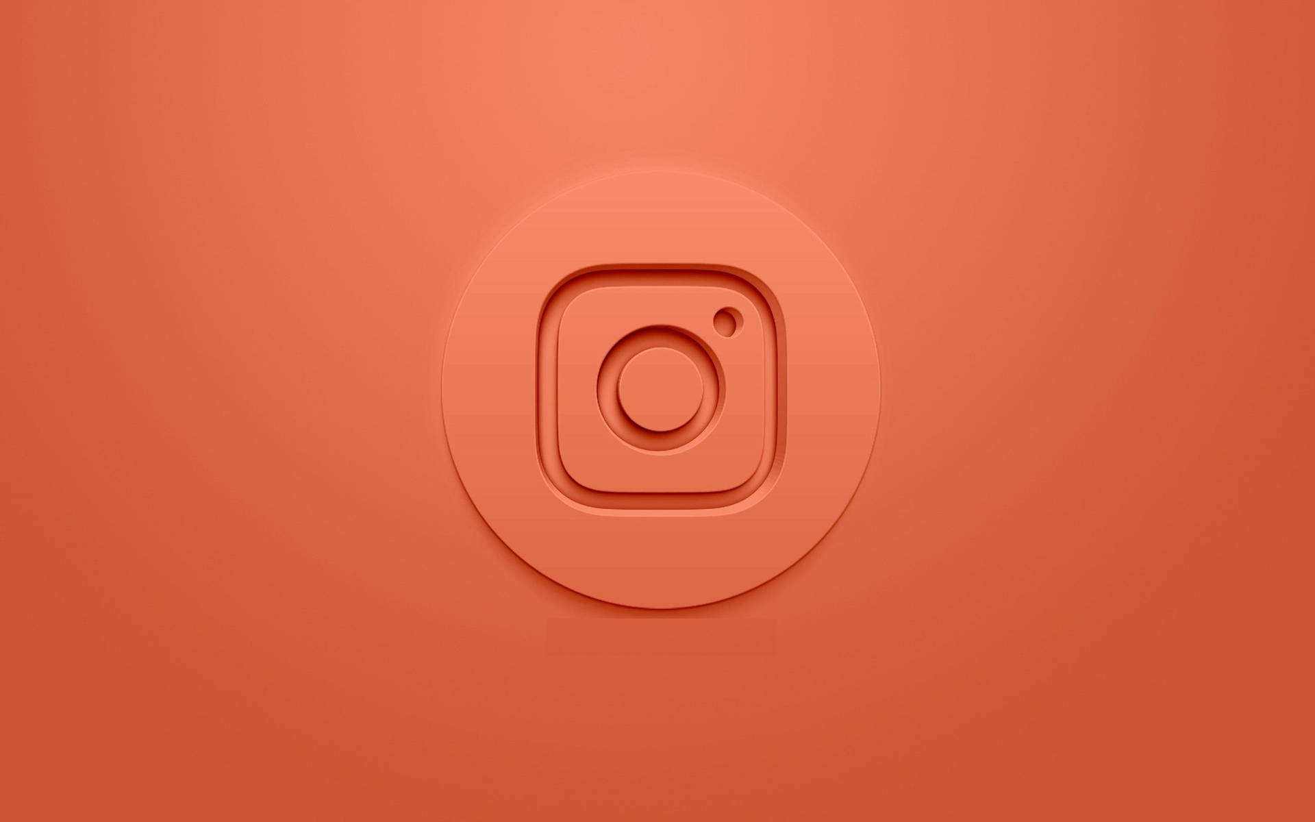橙色背景上的3D渲染Instagram標誌