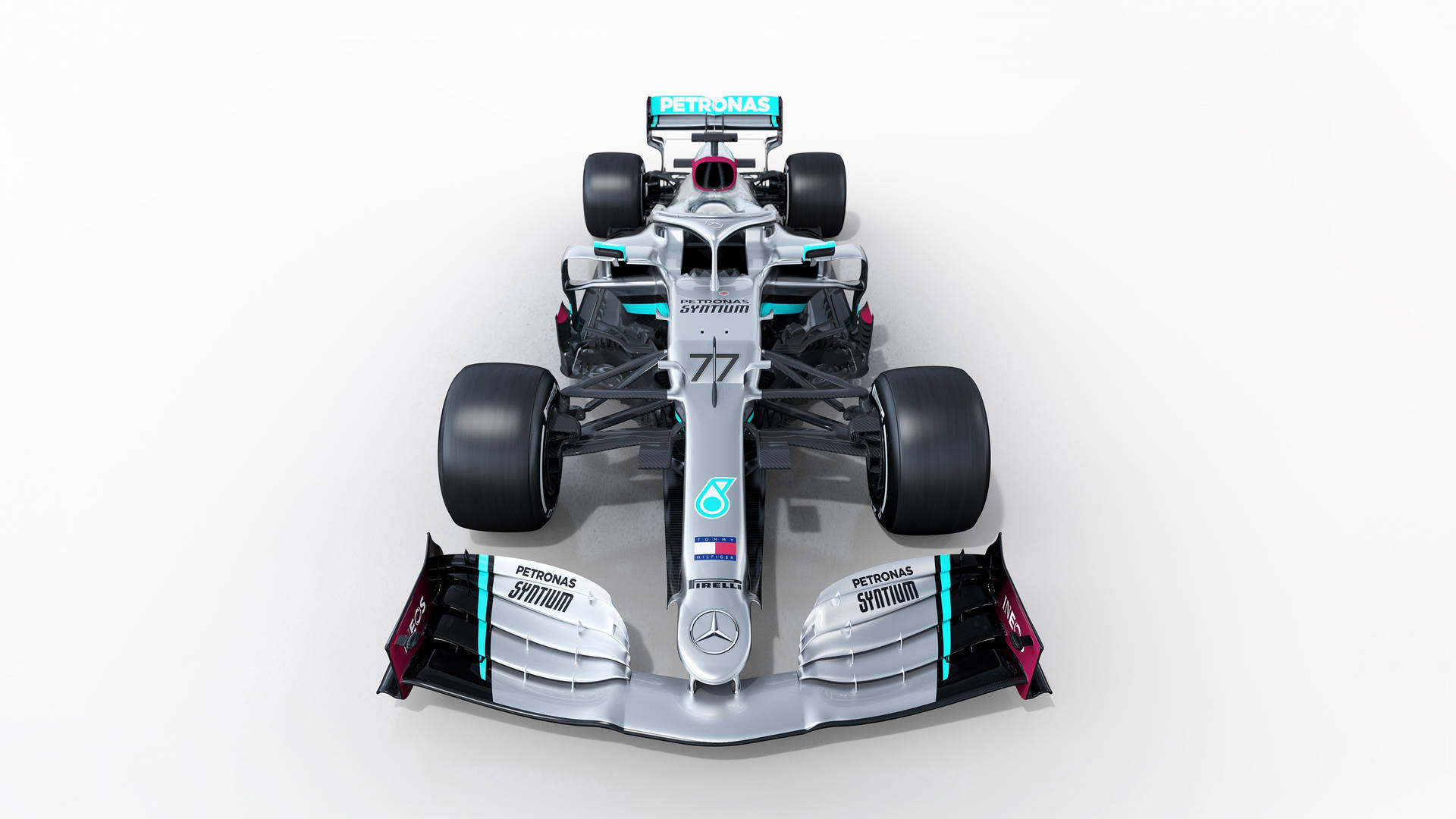 白色背景上從上方俯瞰的銀色和藍綠色 Formula 1 賽車。