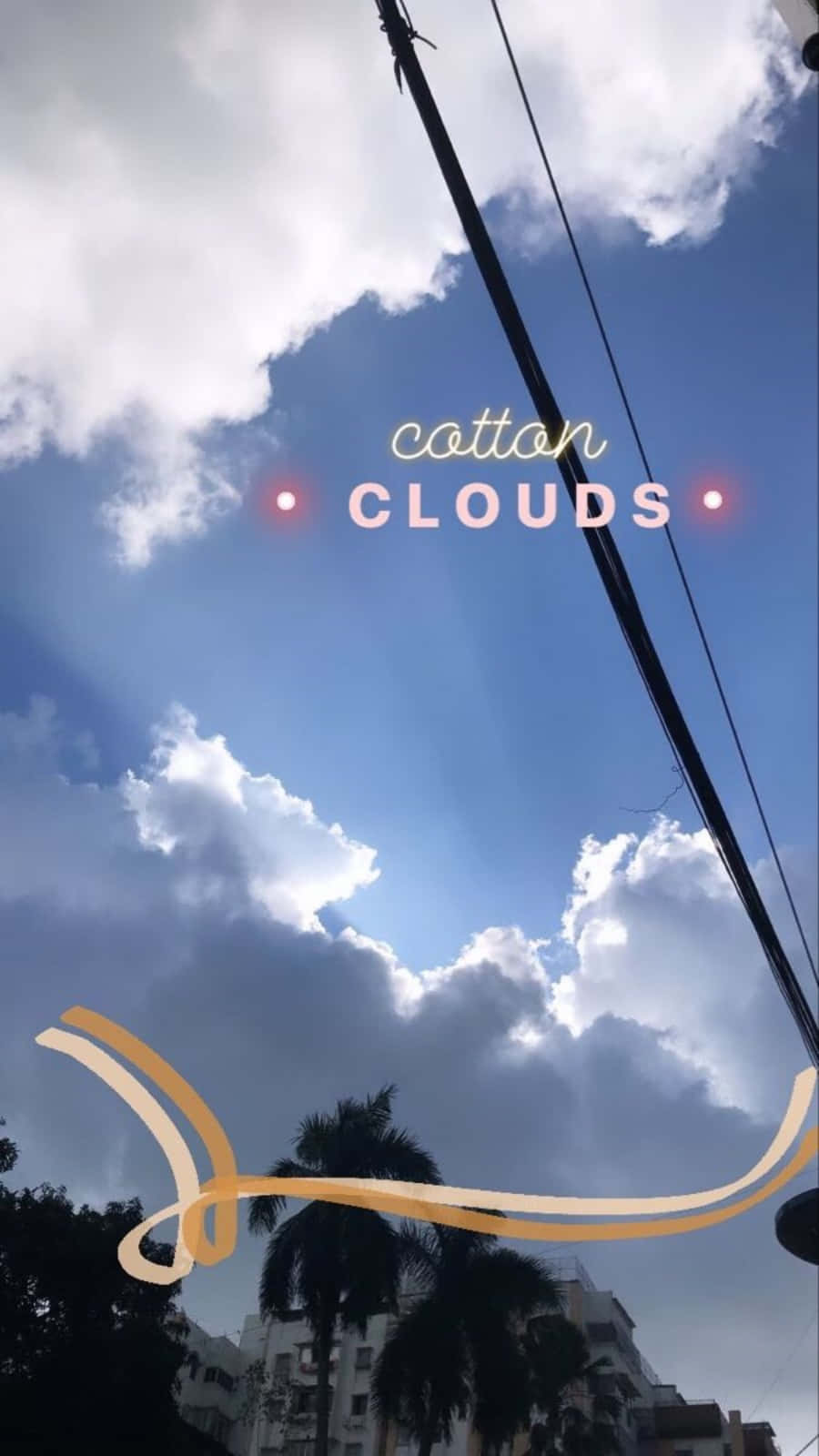 Instagram Story 桌布 壁紙 — 棉花雲在明亮的藍天中飄移，被電線和棕櫚樹框住，以城市景觀為背景。