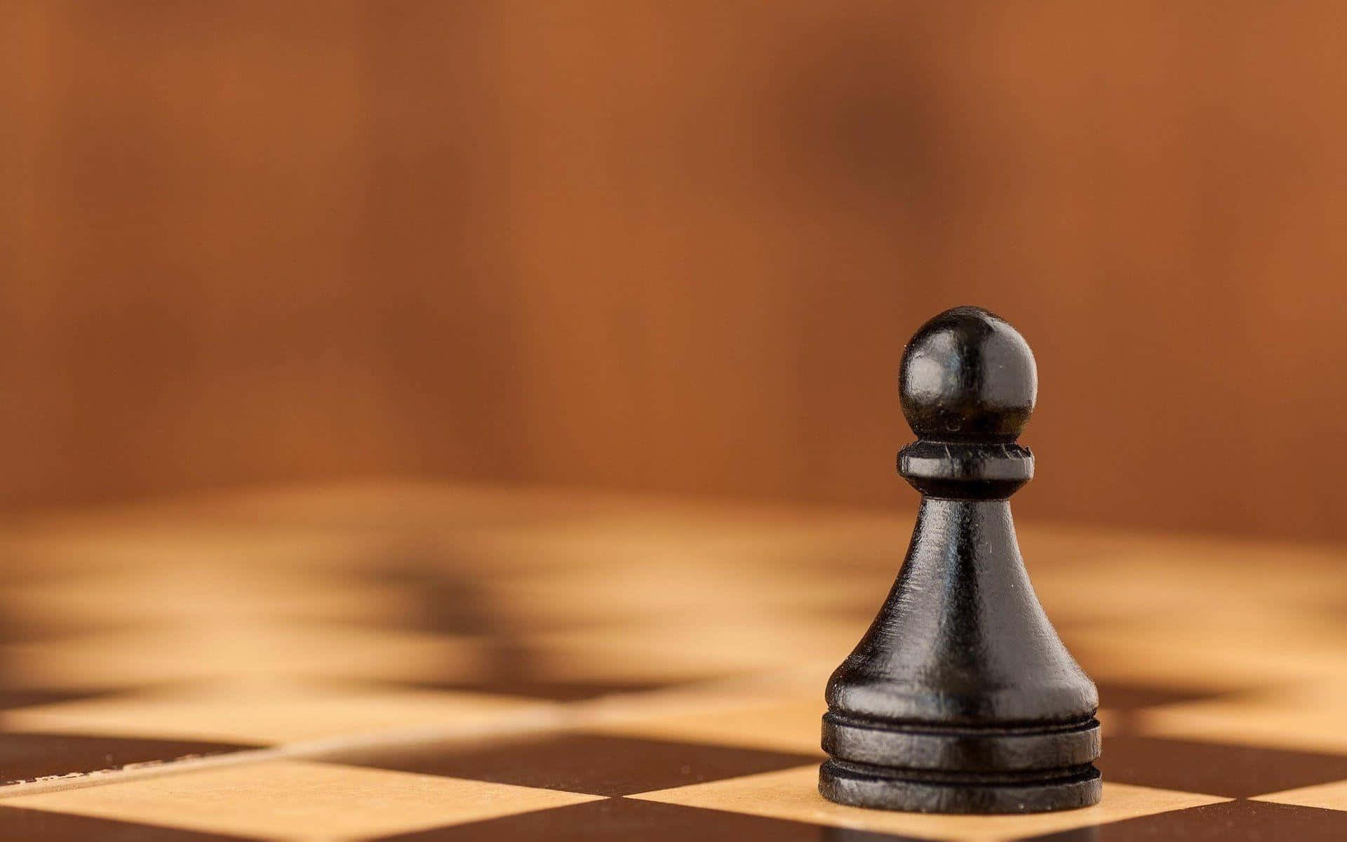 棋盤上的一枚黑色棋子 壁紙