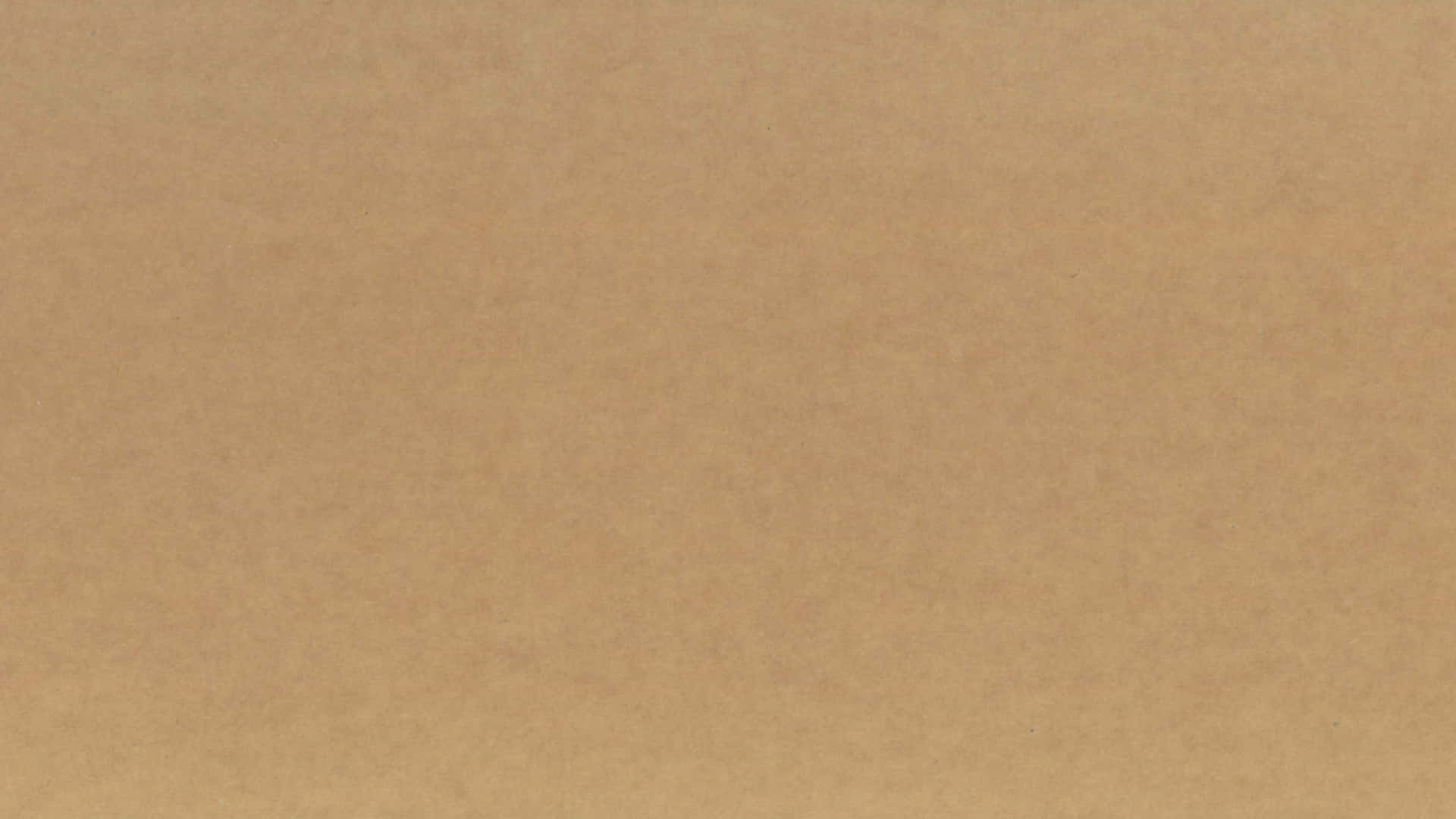 帶有細微顆粒圖案的米色紋理壁紙。