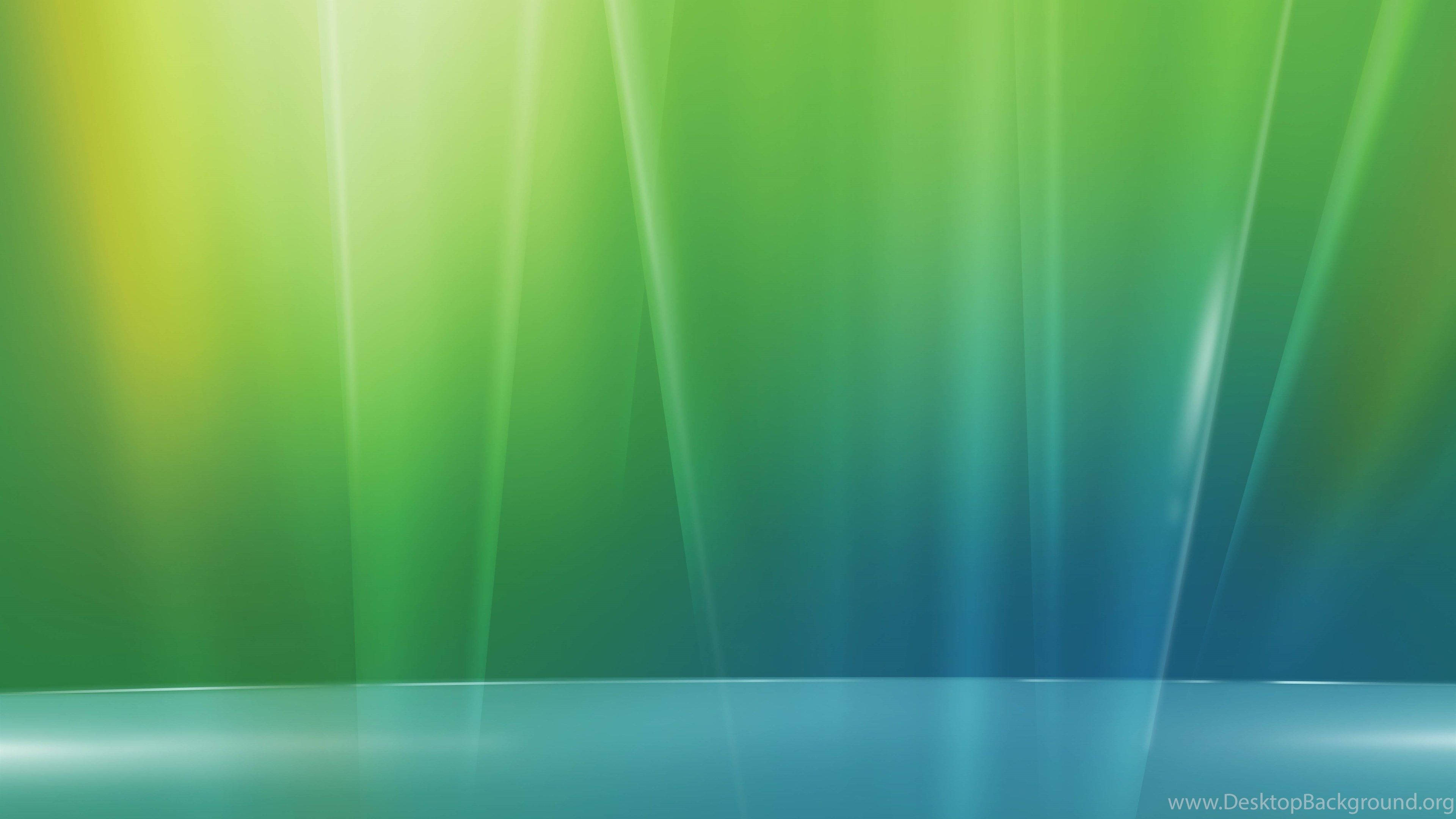 極光 Windows Vista 壁紙 — 充滿活力的綠色和藍色光線在光滑的反射表面上以寧靜的數位漸層傾瀉而下。