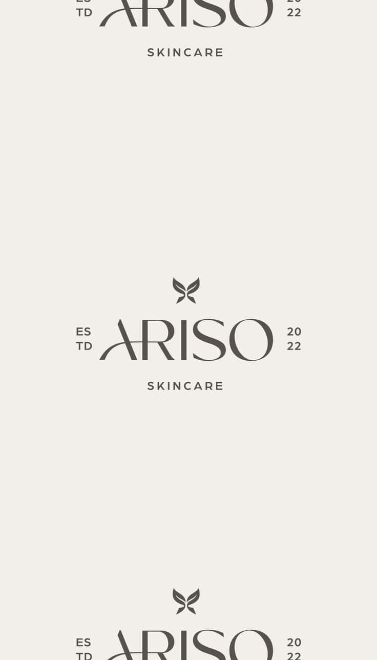 Minimalist Logo 桌布 壁紙 — 極簡品牌壁紙，以優雅灰色字體呈現Ariso Skincare標誌，搭配柔和米色背景。