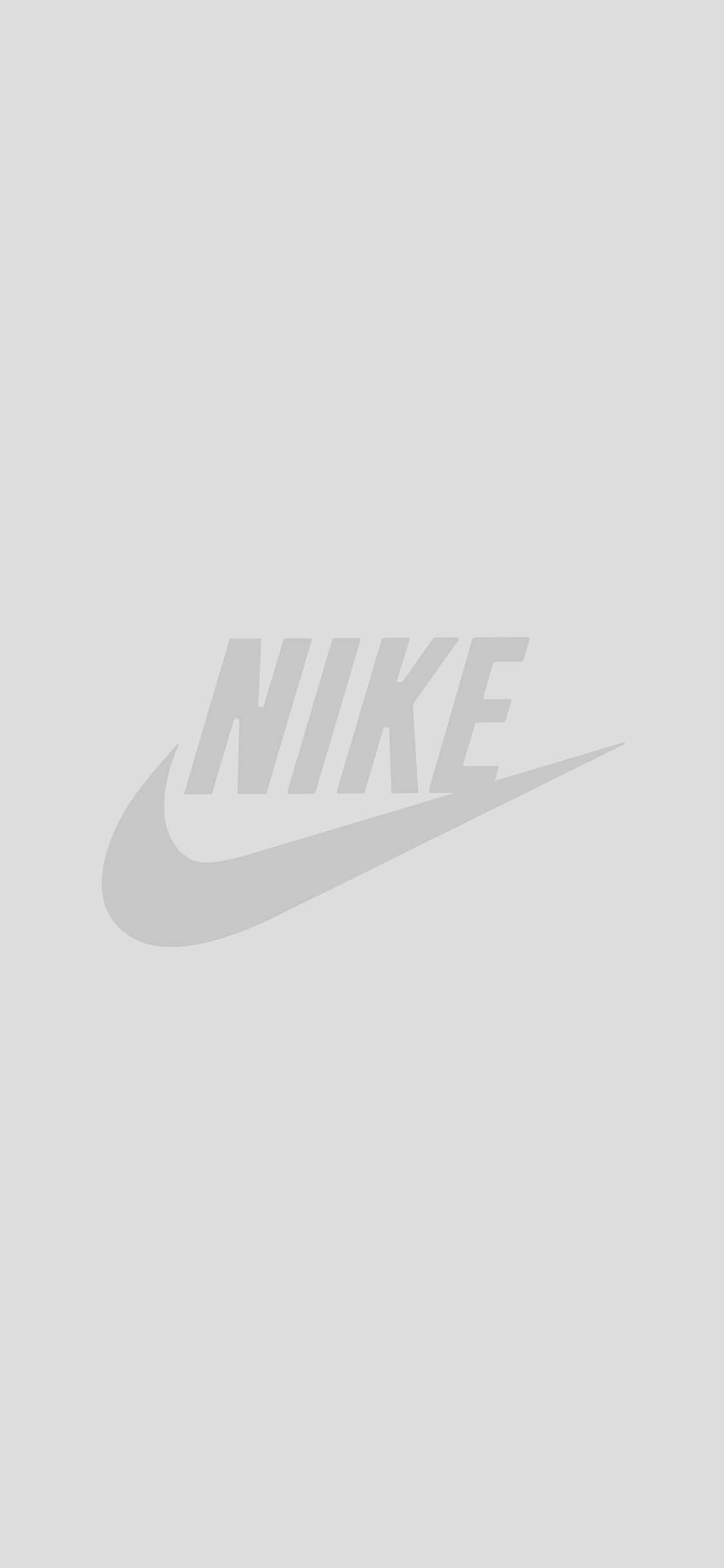 白色 iPhone 桌布 壁紙 — 極簡灰色Nike Swoosh標誌，居中於純淺灰色背景上。