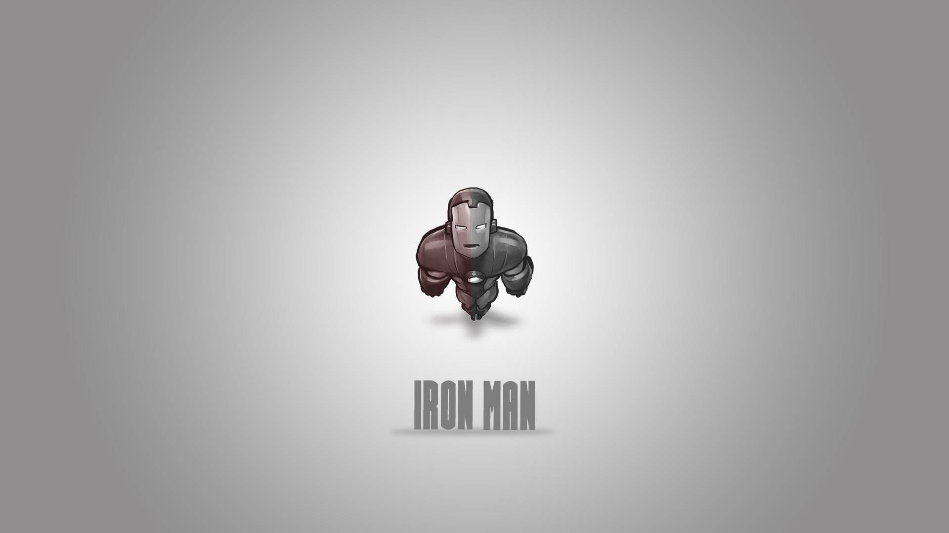 鐵甲奇俠穿著極簡金屬戰衣，下方有「IRON MAN」文字。