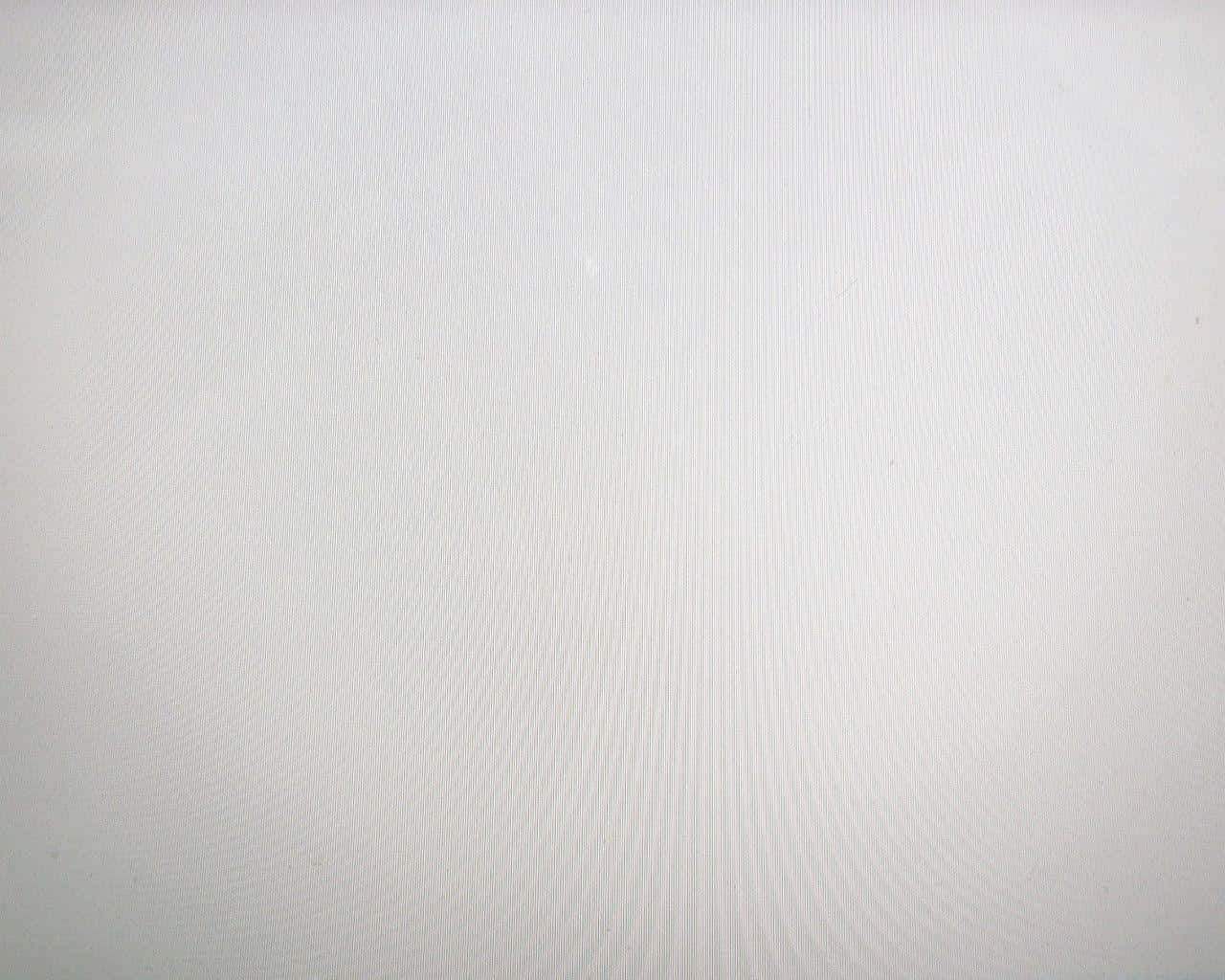純白色紋理表面嘅特寫，帶有微妙嘅斜線。