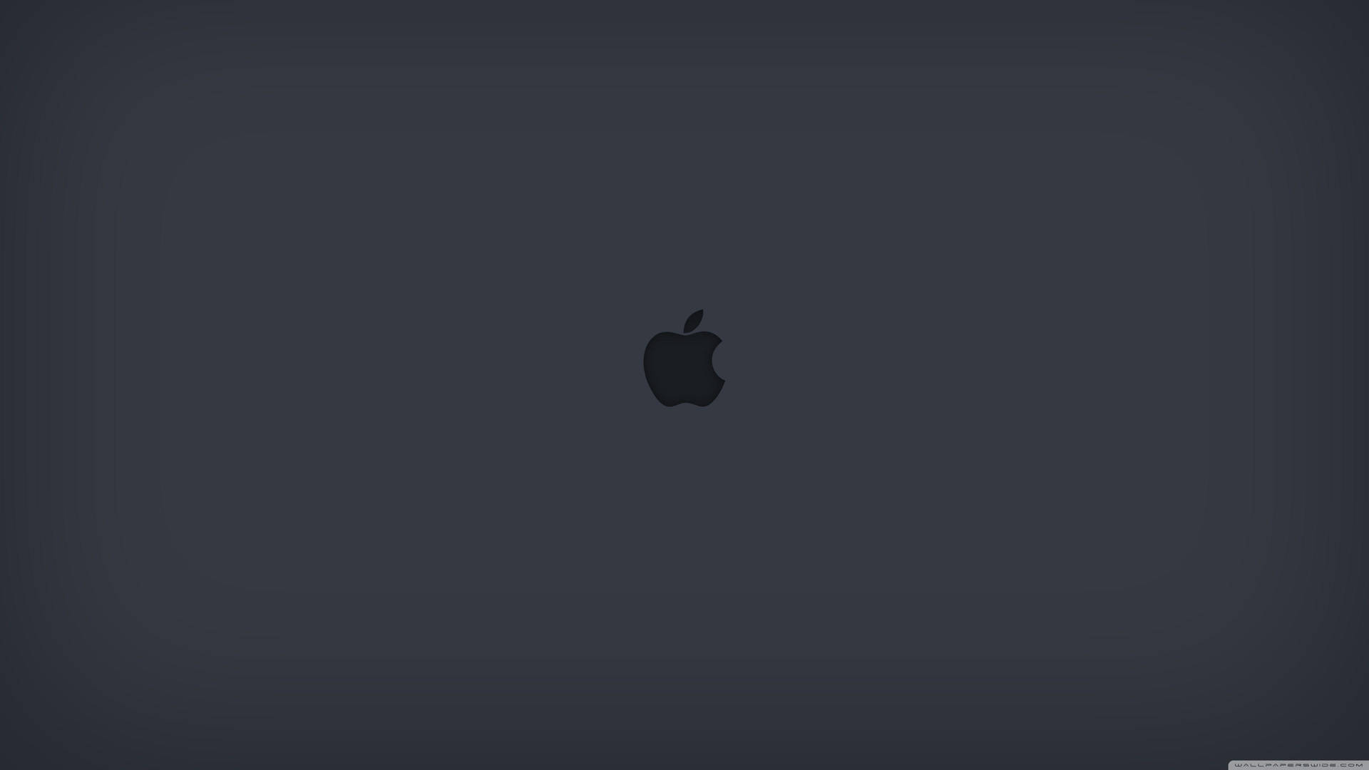 深灰色背景，中央有Apple標誌