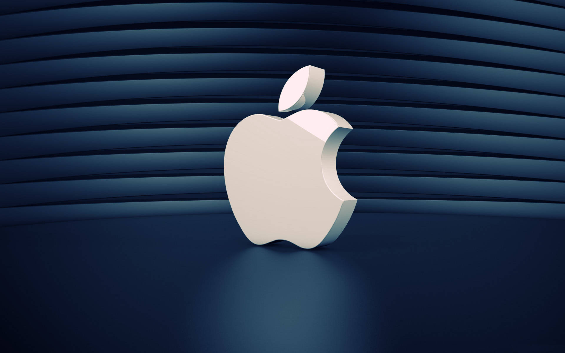 白色Apple標誌在帶有水平紋理的深藍色彎曲表面上。