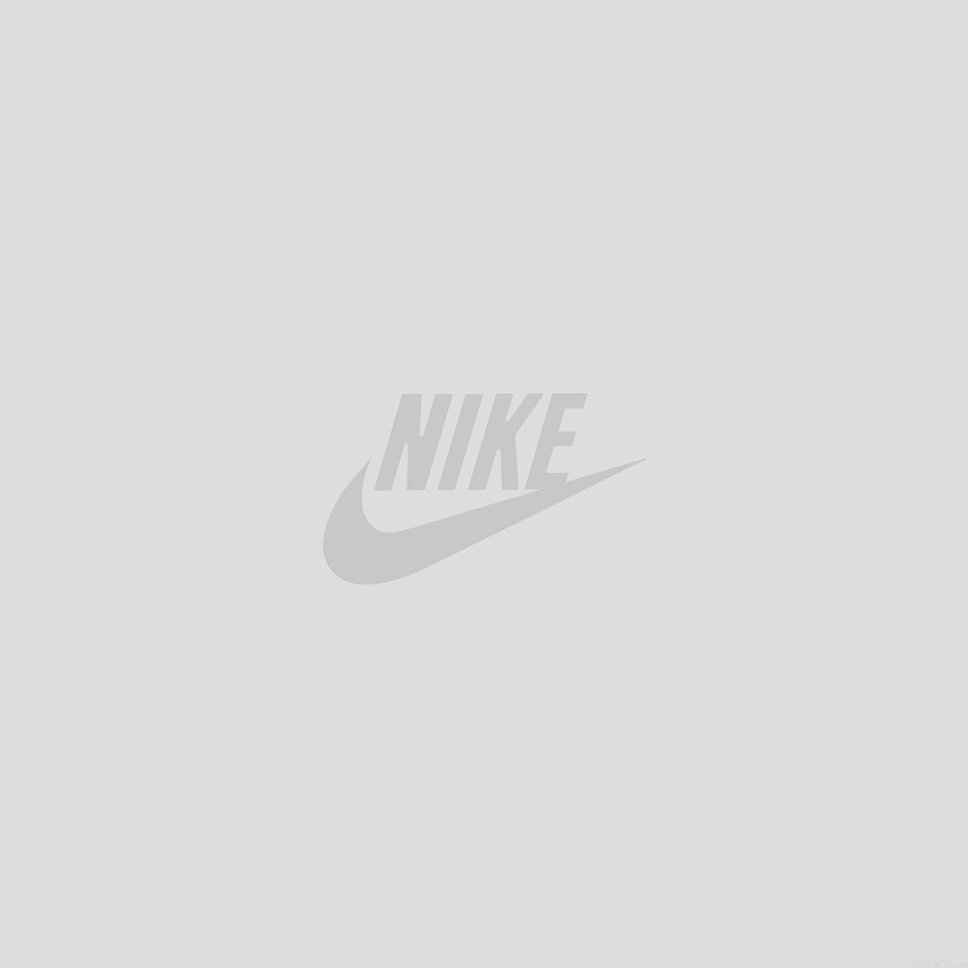 淺灰色背景上的灰色Nike標誌