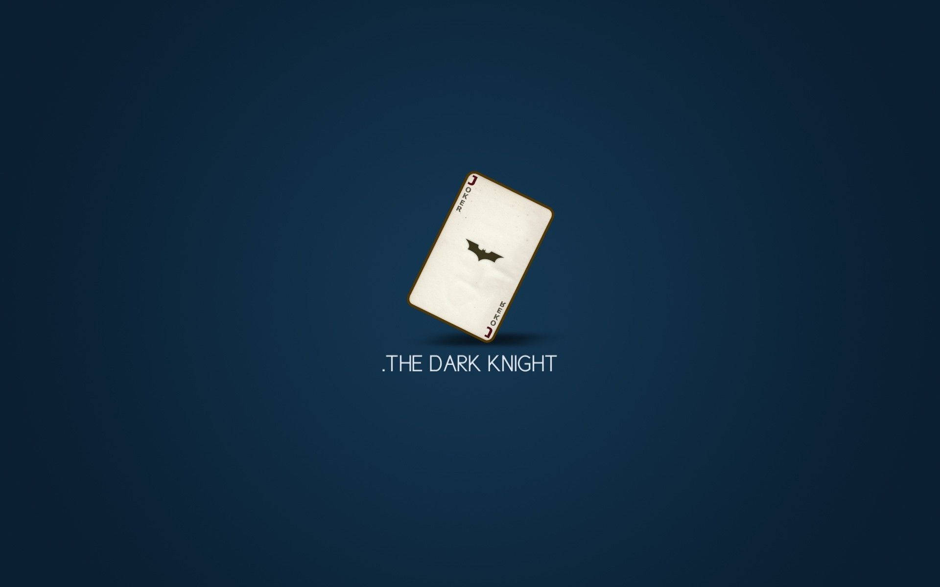 Joker 牌帶有蝙蝠俠標誌和 The Dark Knight 文字，深藍色背景