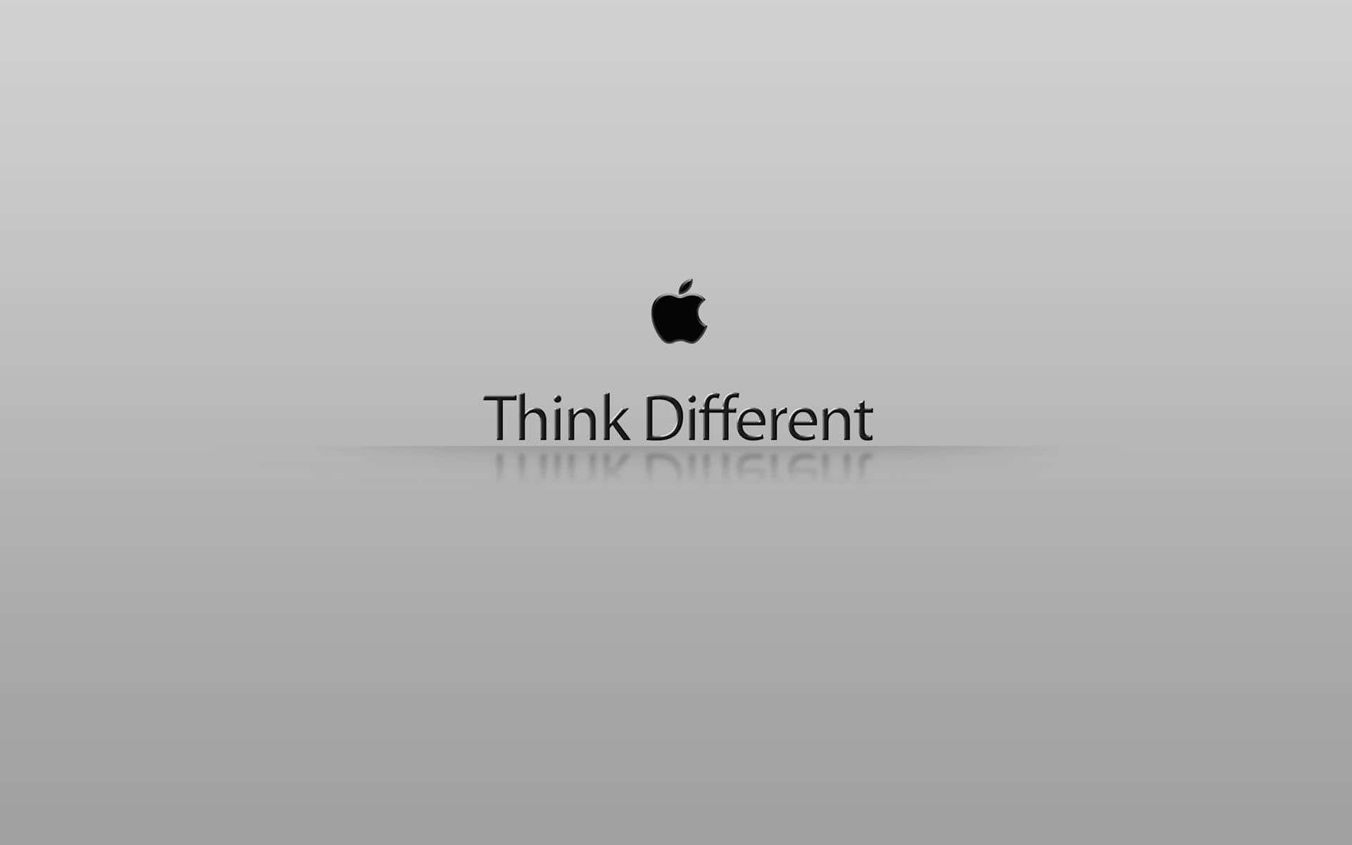 Apple標誌與Think Different標語，灰色漸變背景上的倒影
